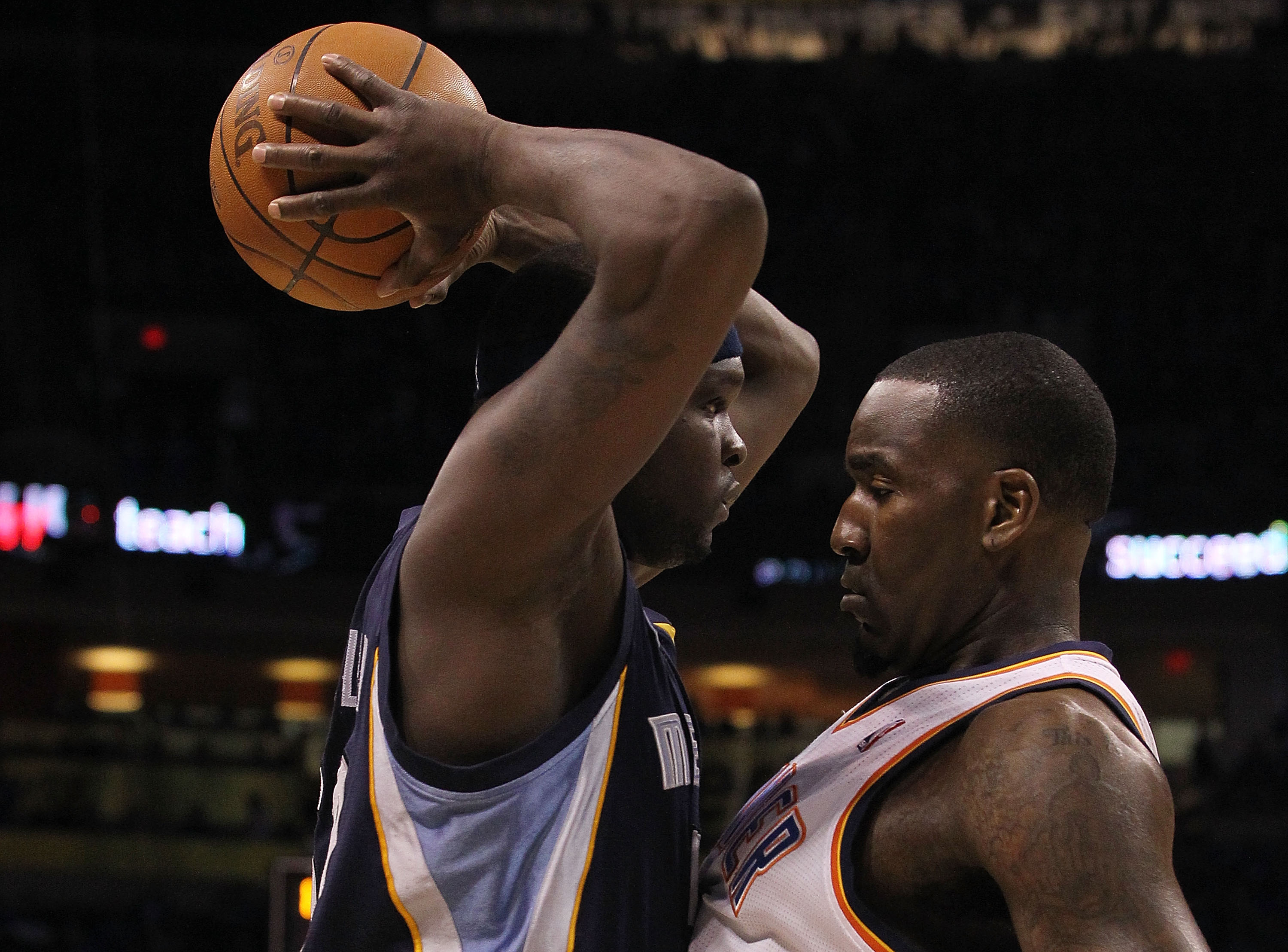OKLAHOMA CITY, OK - MAY 01:  (L-R) Zach Randolph #50 of the Memphis Grizzlies is fouled by Kendrick Perkins #5 of the Oklahoma City Thunder in Game One of the Western Conference Semifinals in the 2011 NBA Playoffs on May 1, 2011 at Oklahoma City Arena in