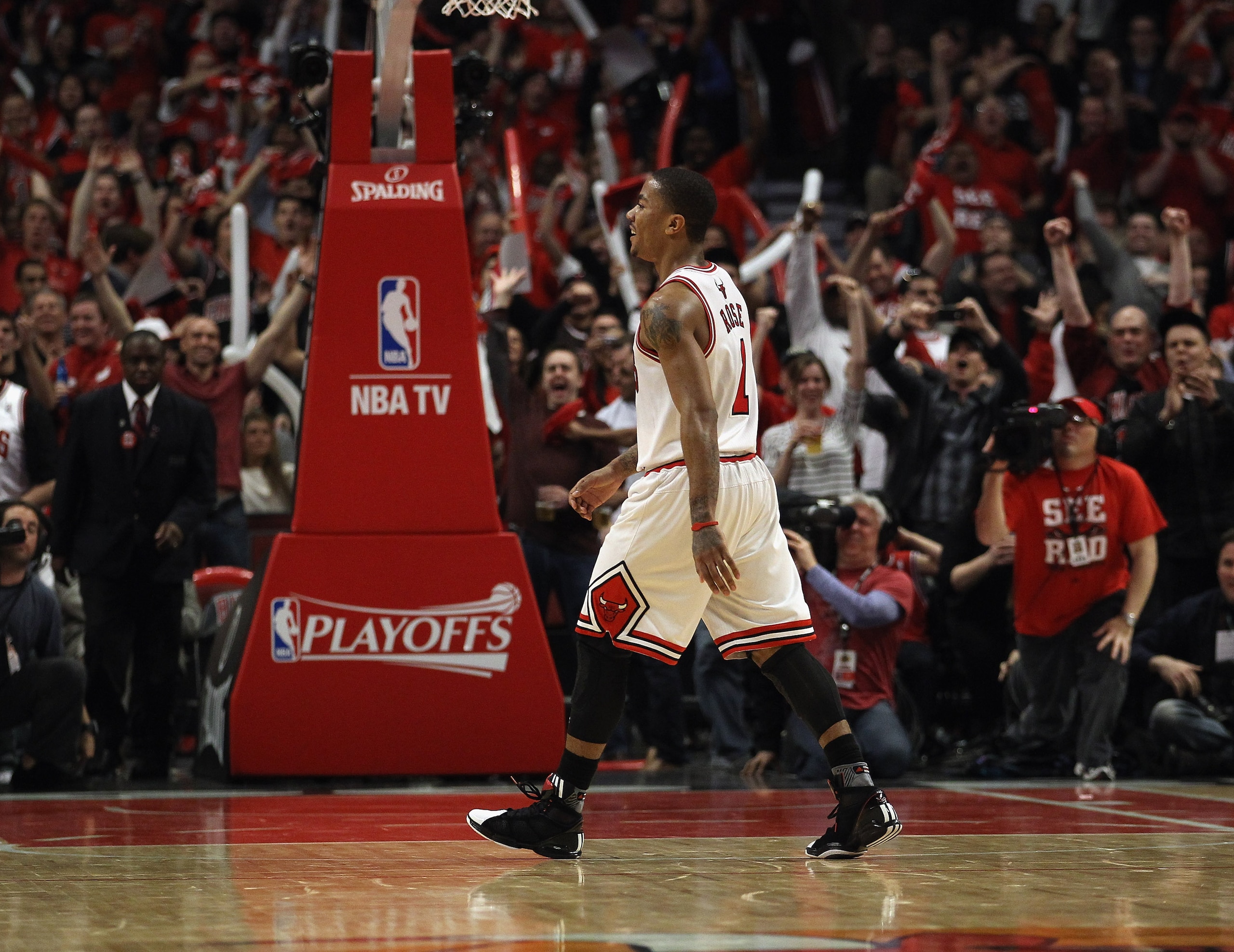 CHICAGO, IL - APRIL 26: Derrick Rose #1 of the Chicago Bulls smiles as he walks off of the court as fans cheer during a time-out against the Indiana Pacers in Game Five of the Eastern Conference Quarterfinals in the 2011 NBA Playoffs at the United Center