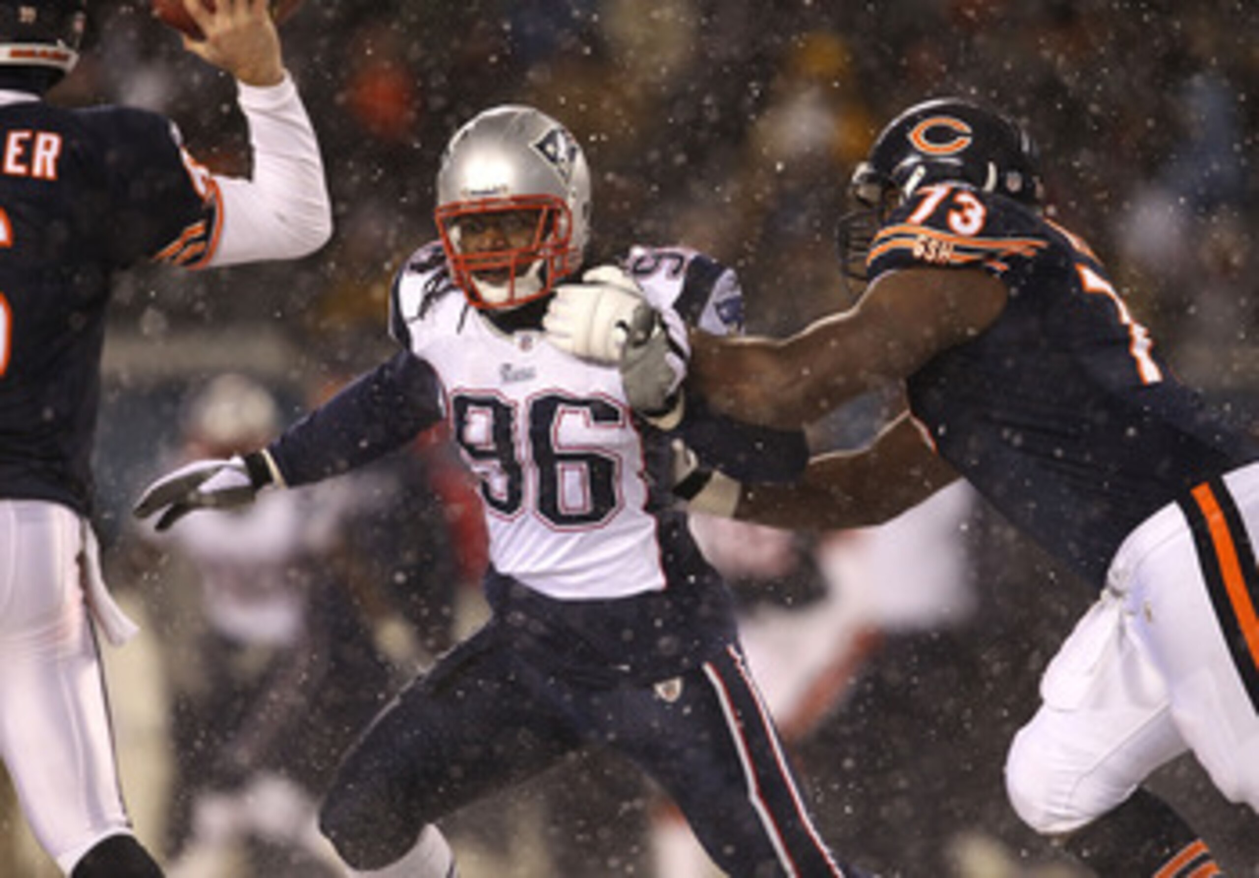 CHICAGO, IL - DECEMBER 12: Jermaine Cunningham #96 of the New England Patriots rushes past J'Marcus Webb #73 of the Chicago Bears towards Jay Cutler #6 at Soldier Field on December 12, 2010 in Chicago, Illinois. The Patriots defeated the Bears 36-7. (Phot CHICAGO, IL - DECEMBER 12: Jermaine Cunningham #96 of the New England Patriots rushes past J'Marcus Webb #73 of the Chicago Bears towards Jay Cutler #6 at Soldier Field on December 12, 2010 in Chicago, Illinois. The Patriots defeated the Bears 36-7. (Phot
