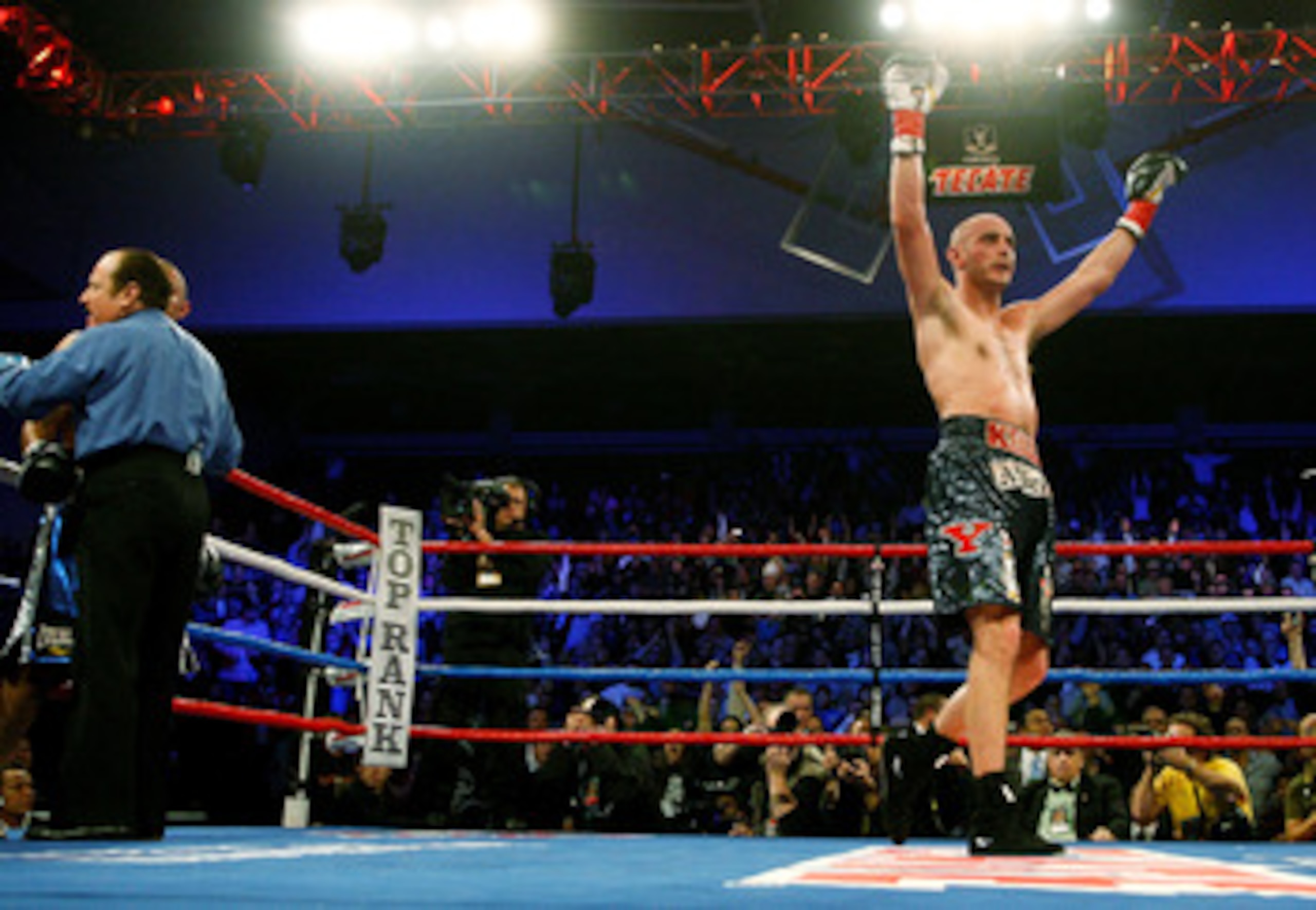 YOUNGSTOWN, OH - DECEMBER 19:  Kelly Pavlik celebrates after defeating Miguel Espino for the World Middleweight Championship during their match at the Beeghly Center on December 19, 2009 in Youngstown, Ohio.  (Photo by Jared Wickerham/Getty Images)