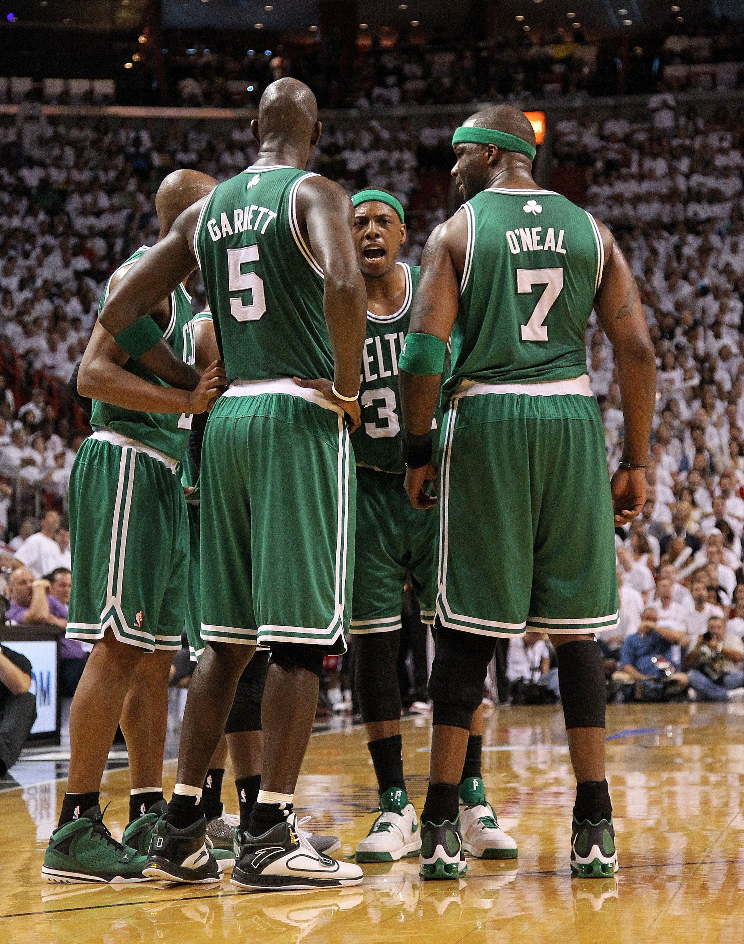 MIAMI, FL - MAY 01: Paul Pierce#34, Jermaine O'neal #7, Ray Allen #20, and Kevin Garnett #5  of the Boston Celtics talk  during game one of the Eastern Conference Semifinals of the 2011 NBA Playoffs against the Miami Heat at American Airlines Arena on May