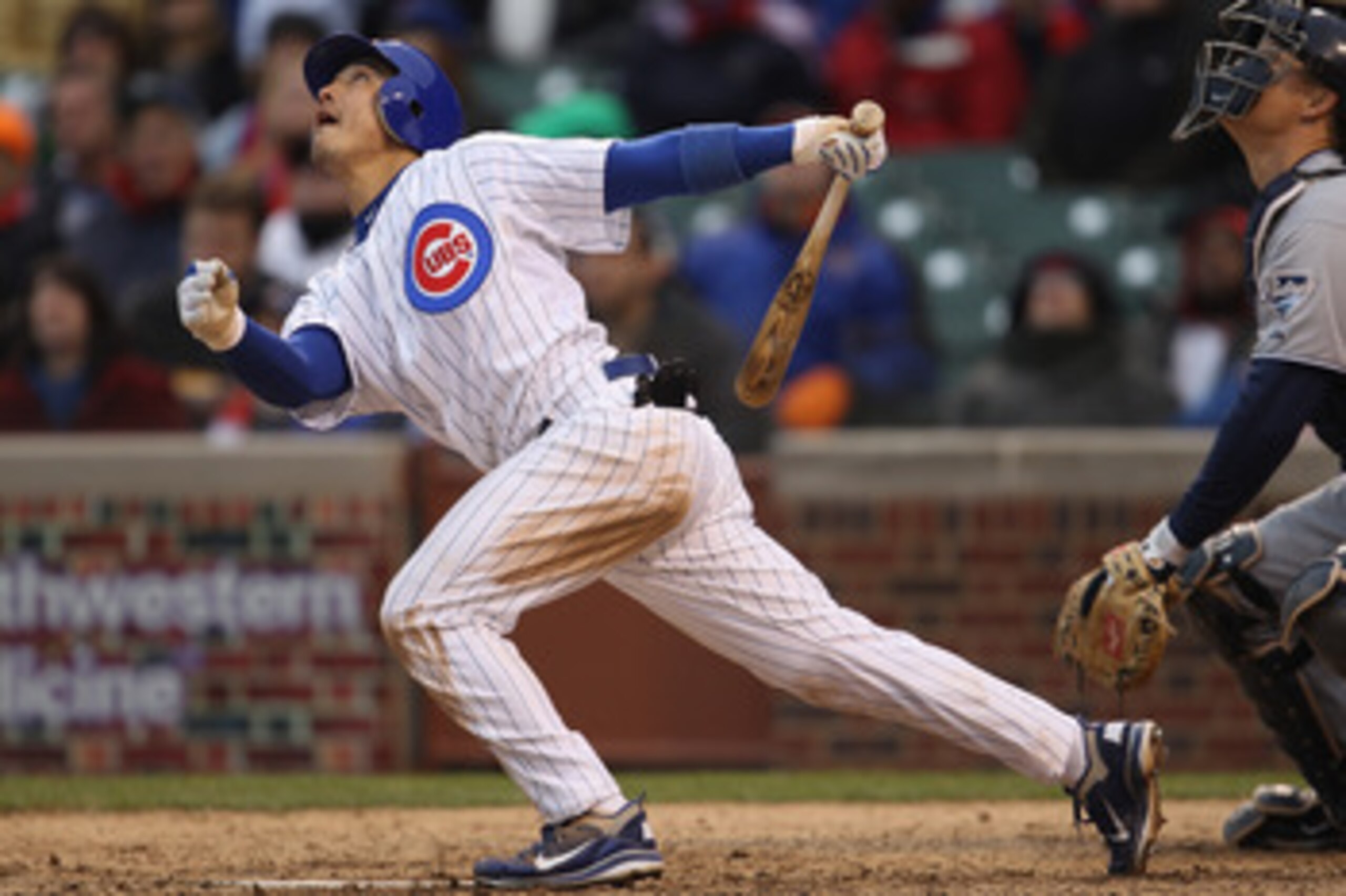CHICAGO, IL - APRIL 20: Darwin Barney #15 of the Chicago Cubs follows the ball against the San Diego Padres at Wrigley Field on April 20, 2011 in Chicago, Illinois. The Cubs defeated the Padres 2-1 in 11 innings. (Photo by Jonathan Daniel/Getty Images)