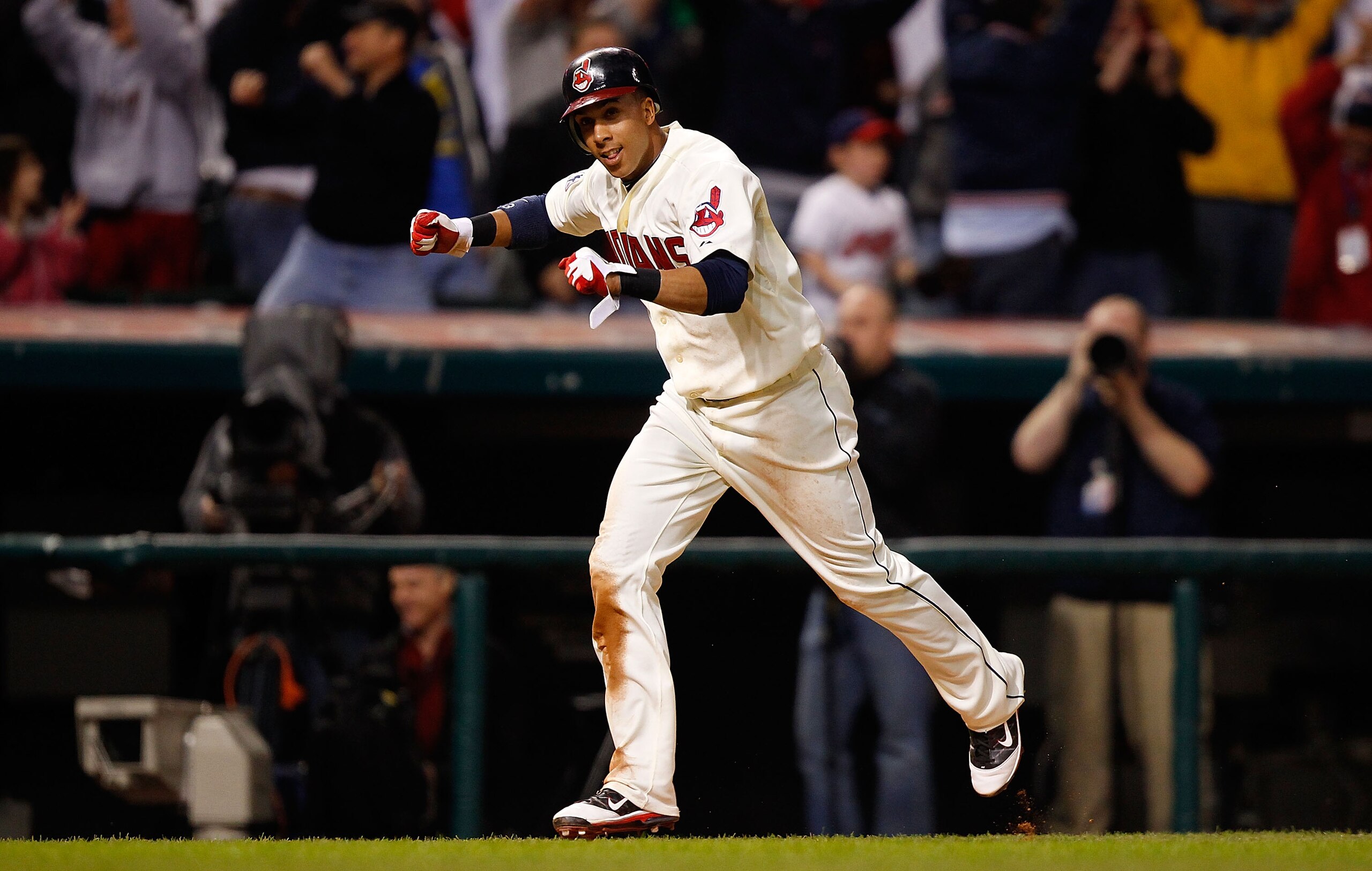 CLEVELAND - APRIL 30: Michael Brantley #23 of the Cleveland Indians celebrates before scoring the game winning run in the 13th inning on a single by teammate Orlando Cabrera #20 against the Detroit Tigers during the game on April 30, 2011 at Progressive CLEVELAND - APRIL 30: Michael Brantley #23 of the Cleveland Indians celebrates before scoring the game winning run in the 13th inning on a single by teammate Orlando Cabrera #20 against the Detroit Tigers during the game on April 30, 2011 at Progressive
