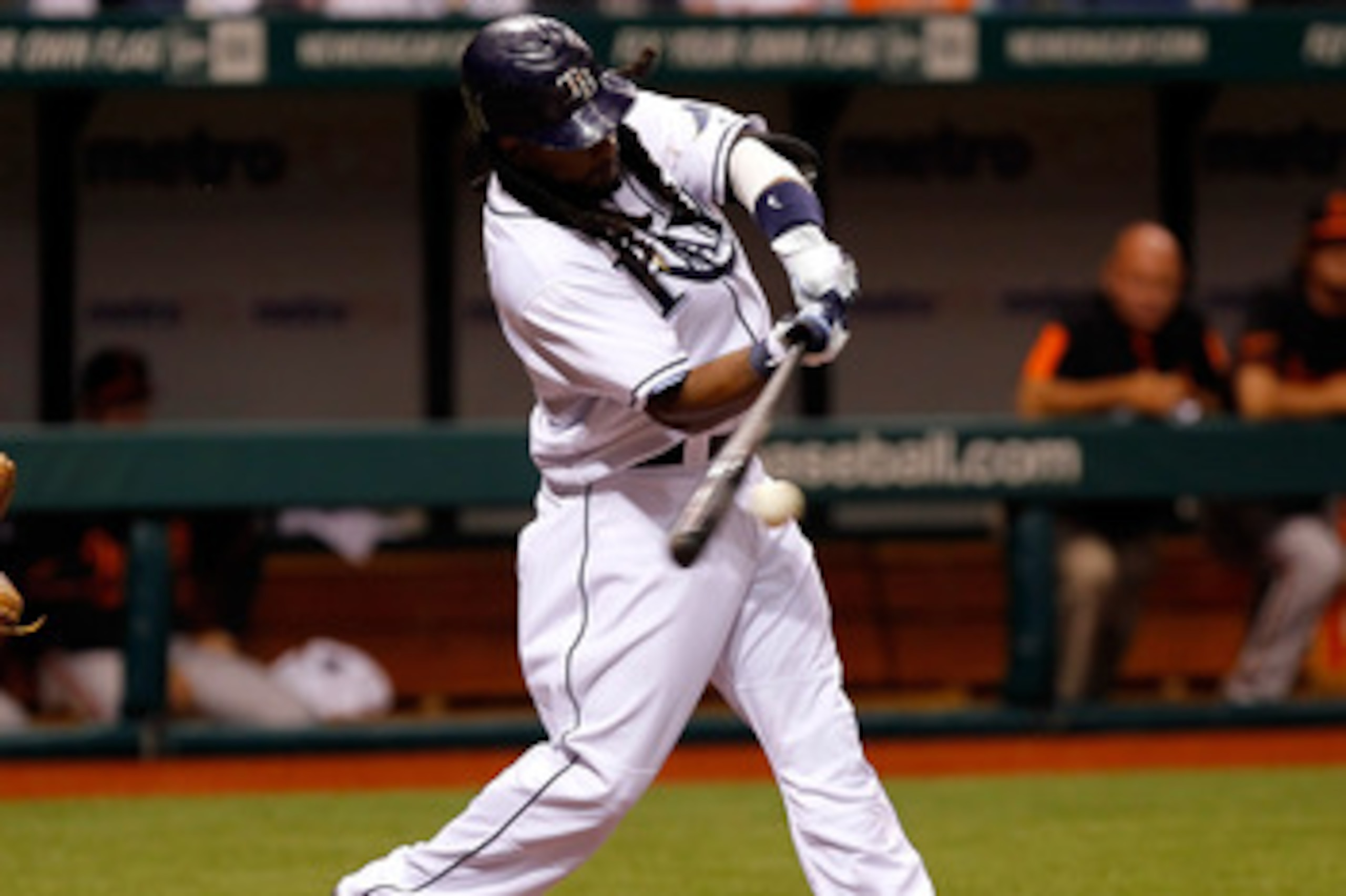 ST. PETERSBURG, FL - APRIL 01:  Designated hitter Manny Ramirez #24 of the Tampa Bay Rays fouls off a pitch against the Baltimore Orioles during the Opening Day game at Tropicana Field on April 1, 2011 in St. Petersburg, Florida.  (Photo by J. Meric/Getty