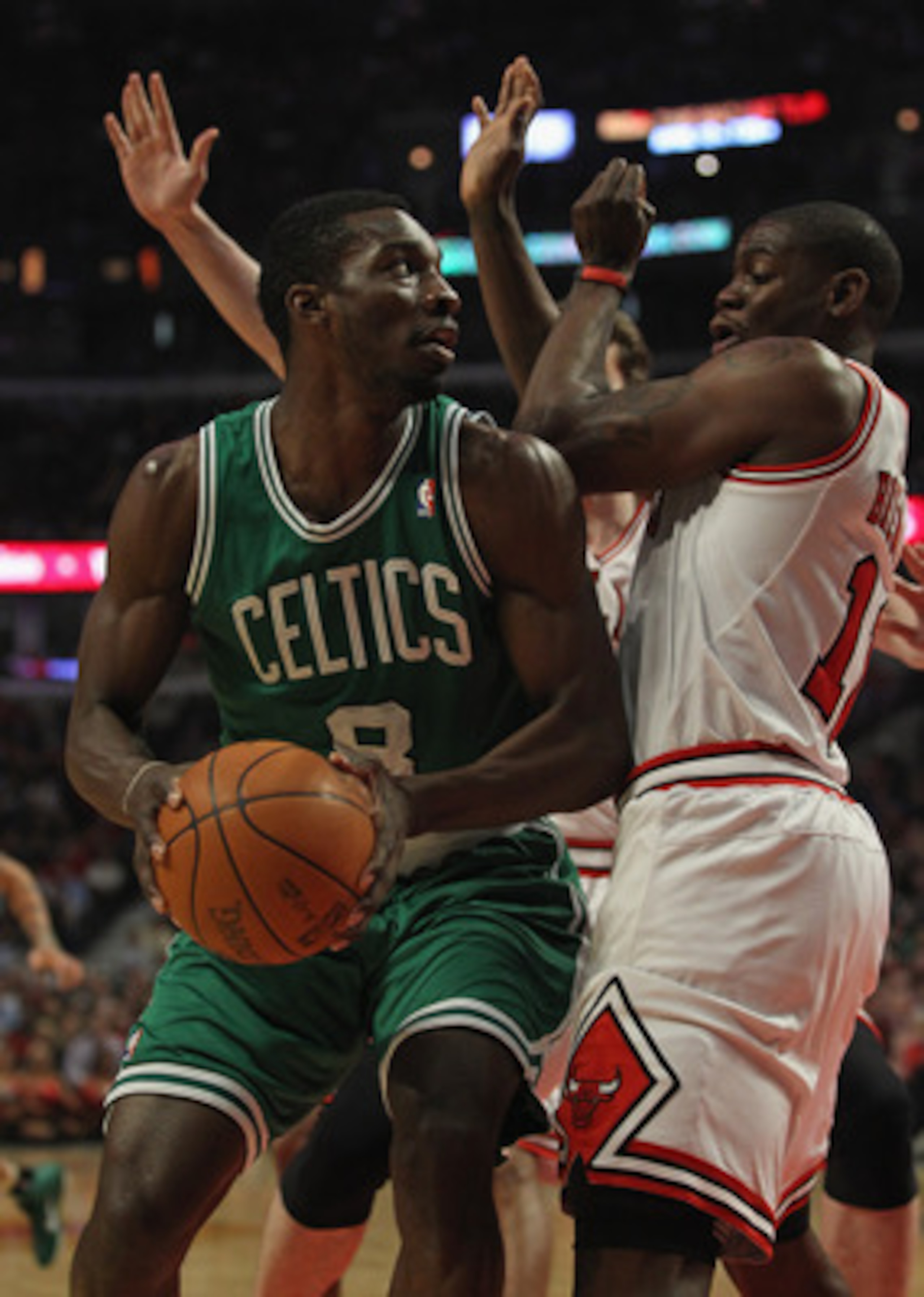 CHICAGO, IL - APRIL 07: Jeff Green #8 of the Boston Celtics moves against Ronnie Brewer #11 of the Chicago Bulls at United Center on April 7, 2011 in Chicago, Illinois. The Bulls defeated the Celtics 97-81. NOTE TO USER: User expressly acknowledges and ag
