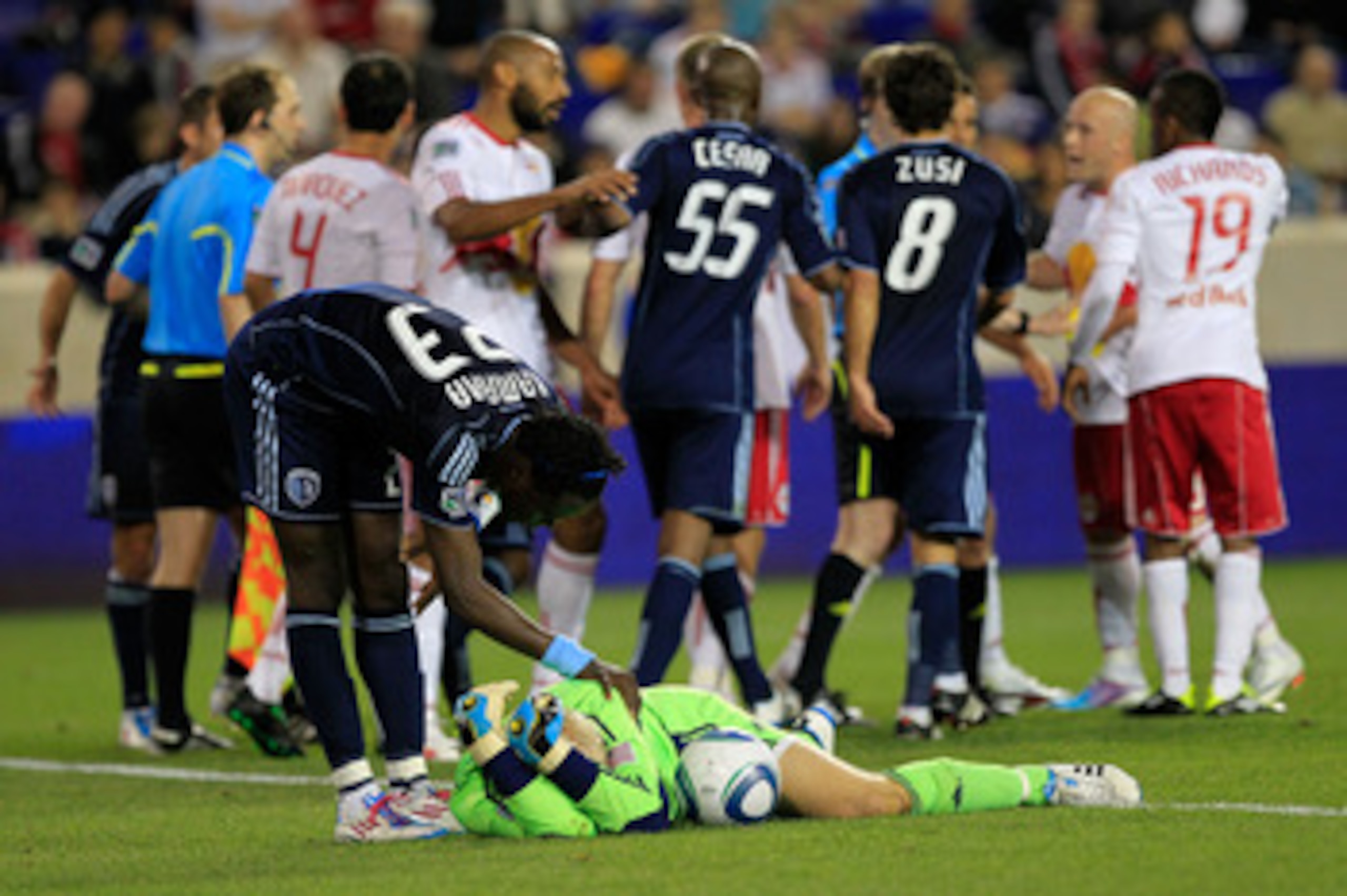 HARRISON, NJ - APRIL 30: Kei Kamara #23 of the Sporting Kansas City checks on his teammate Jimmy Nielsen #1 after he is fouled by Luke Rodgers #9 of the New York Red Bulls at Red Bull Arena on April 30, 2011 in Harrison, New Jersey. The Red Bulls defeated
