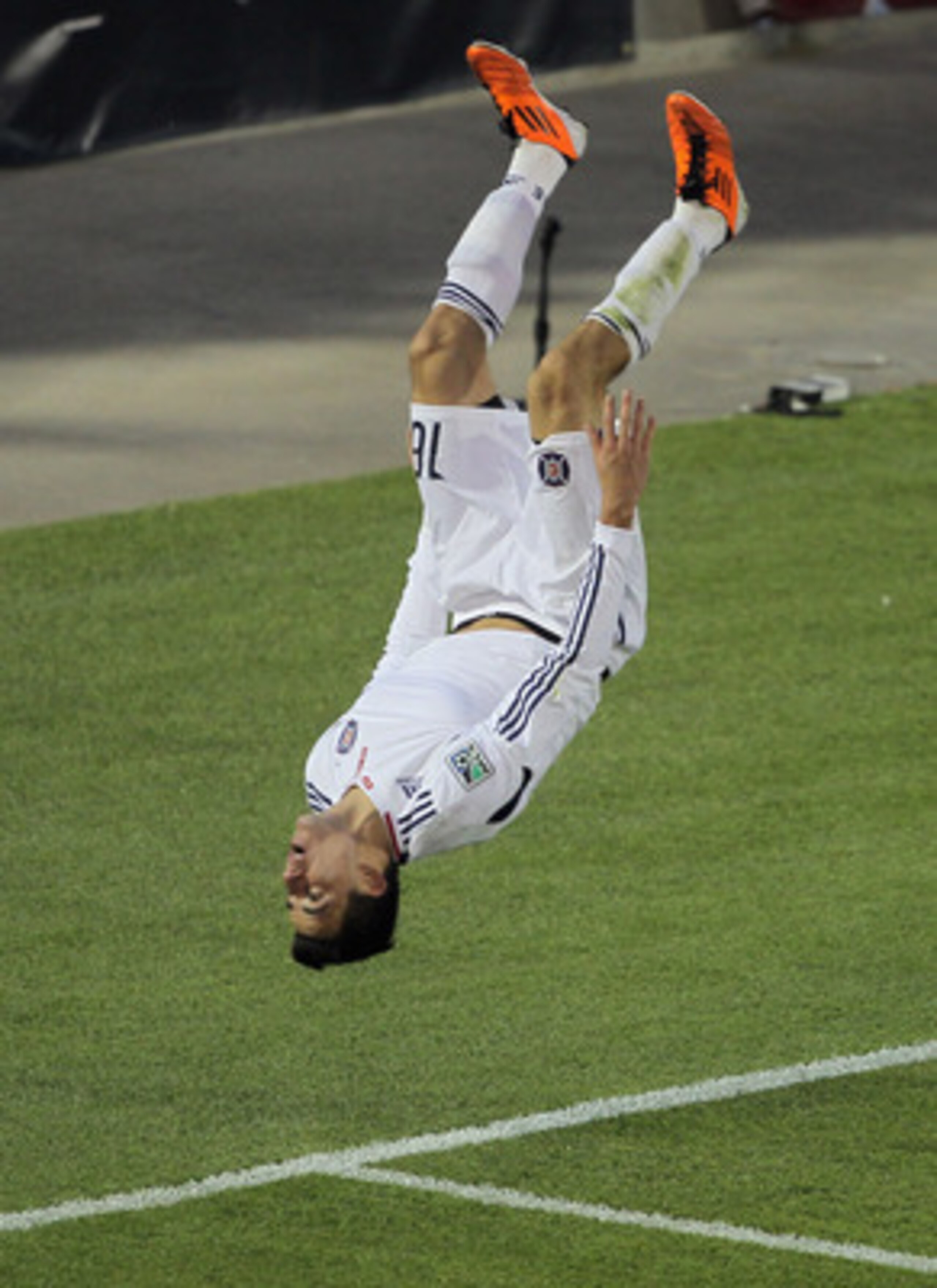 COMMERCE CITY, CO - APRIL 30:  Marco Pappa #16 of the Chicago Fire does a flip as he celebrates his goal in the 43rd minute against the Colorado Rapids at Dick's Sporting Goods Park on April 30, 2011 in Commerce City, Colorado.  (Photo by Doug Pensinger/G
