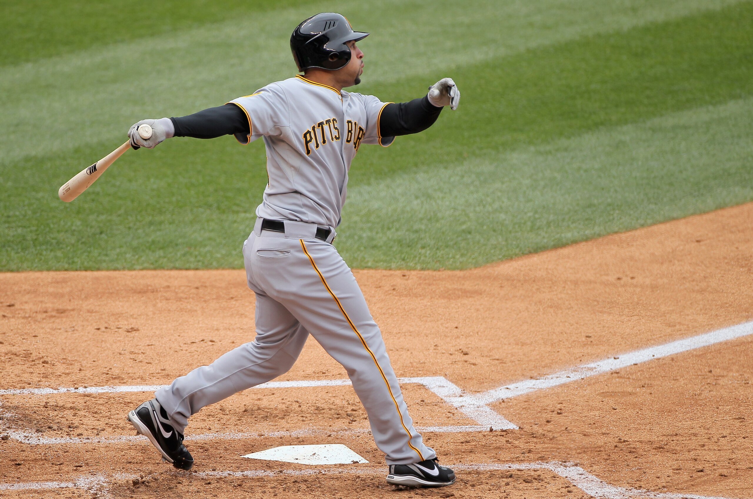 DENVER, CO - MAY 01: Xavier Paul #38 of the Pittsburgh Pirates hits a two RBI triple off of starting pitcher Ubaldo Jimenez of the Colorado Rockies to give the Pirates a 3-0 lead in the second inning at Coors Field on May 1, 2011 in Denver, Colorado. (P DENVER, CO - MAY 01: Xavier Paul #38 of the Pittsburgh Pirates hits a two RBI triple off of starting pitcher Ubaldo Jimenez of the Colorado Rockies to give the Pirates a 3-0 lead in the second inning at Coors Field on May 1, 2011 in Denver, Colorado. (P
