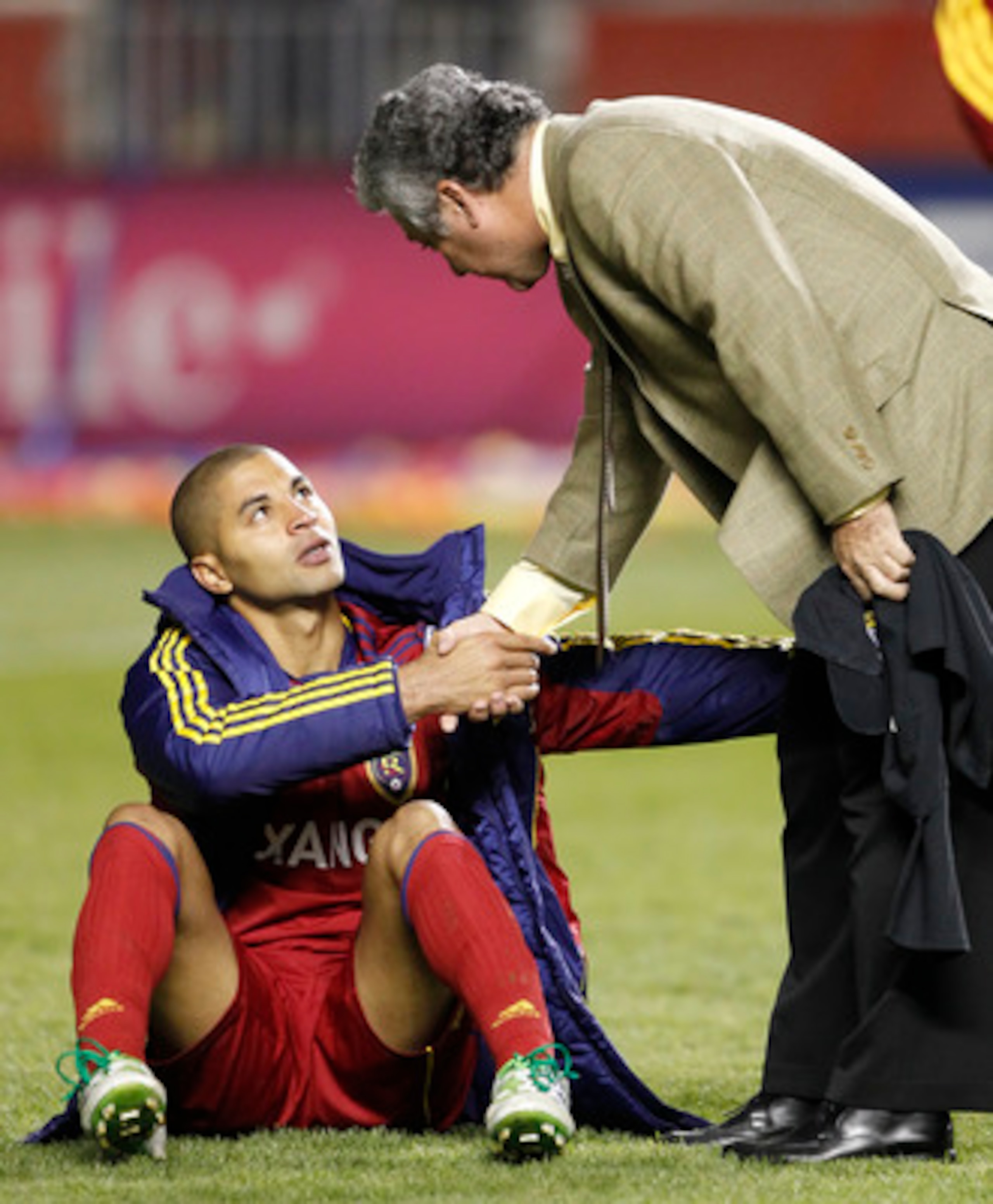 SANDY, UT - APRIL 27: Alvaro Saborio #15 of Real Salt Lake shakes the hand of head coach Victor Manuel Vucetich of Monterrey Mexico after they lost during the second half of the CONCACAF Championship game April 27, 2011 at Rio Tinto Stadium in Sandy, Utah