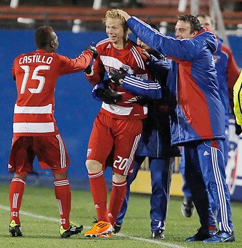 FRISCO, TX - MAY 1: Brek Shea #20 of FC Dallas is congratulated by teammates after scoring what would be the game winning goal against the Los Angeles Galaxy during the second half of a soccer game at Pizza Hut Park on May 1, 2011 in Frisco, Texas. FC Dal