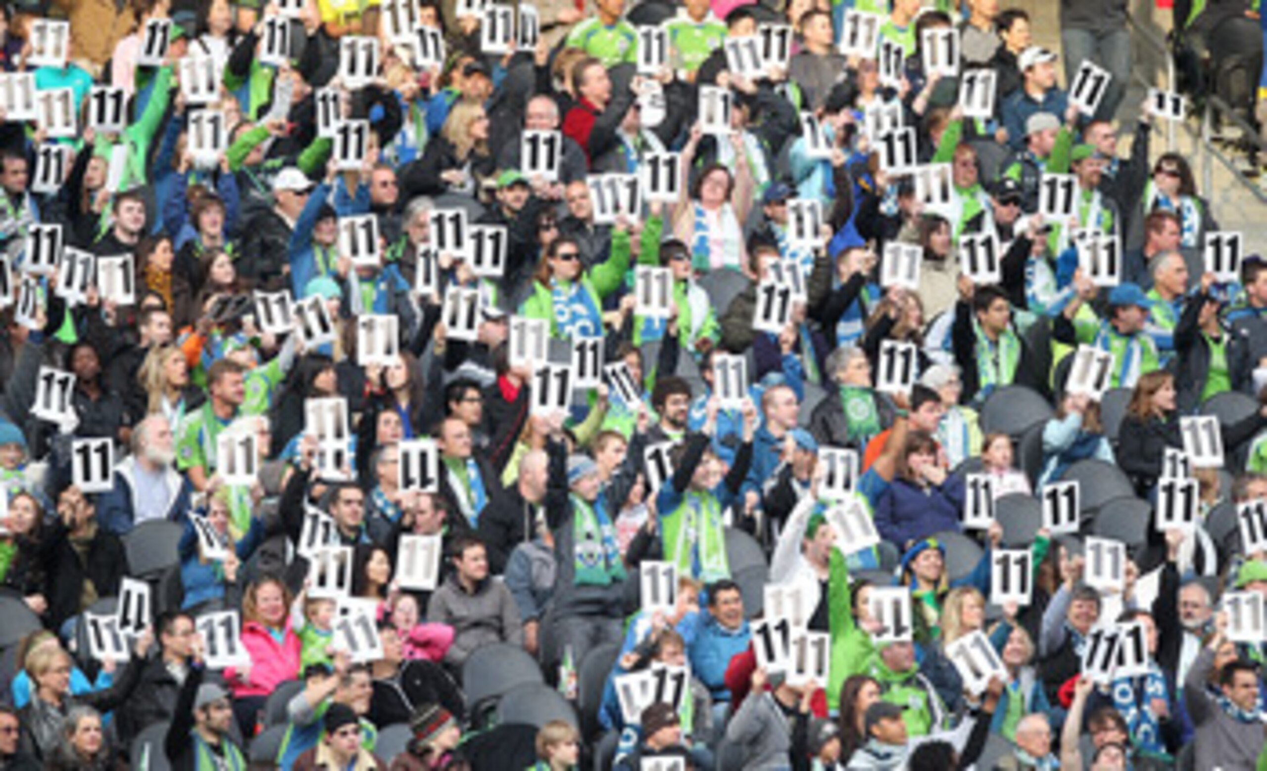 SEATTLE - APRIL 30:  Fans of the Seattle Sounders FC hold signs in honor of Steve Zakuani #11 during the game against Toronto FC at Qwest Field on April 30, 2011 in Seattle, Washington. Zakuani was injured last week and is not playing. (Photo by Otto Greu