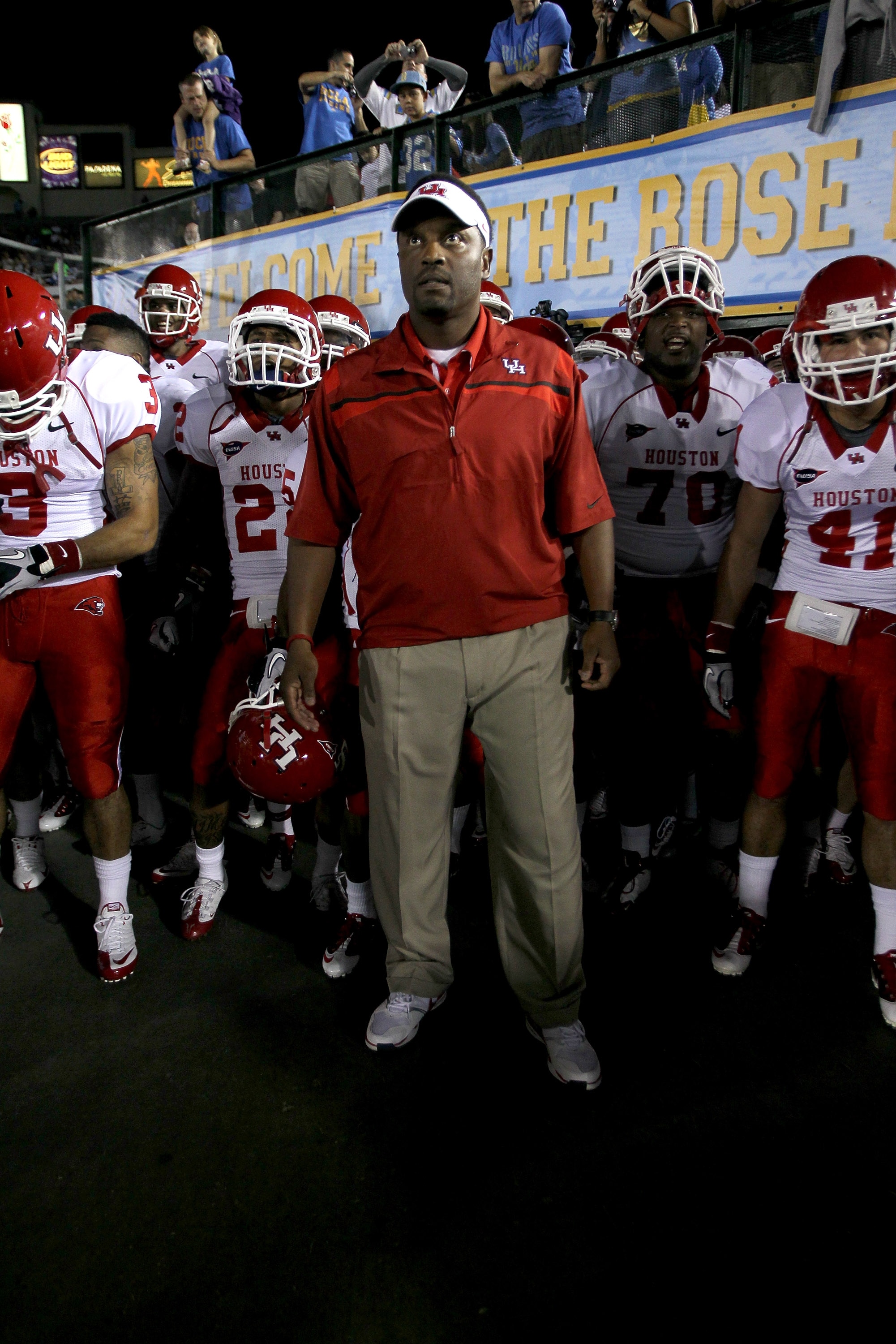 PASADENA, CA - SEPTEMBER 18:  Head coach Kevin Sumlin of the Houston Cougars leads his team onto the field before the game with the UCLA Bruins at the Rose Bowl on September 18, 2010 in Pasadena, California.  (Photo by Stephen Dunn/Getty Images)