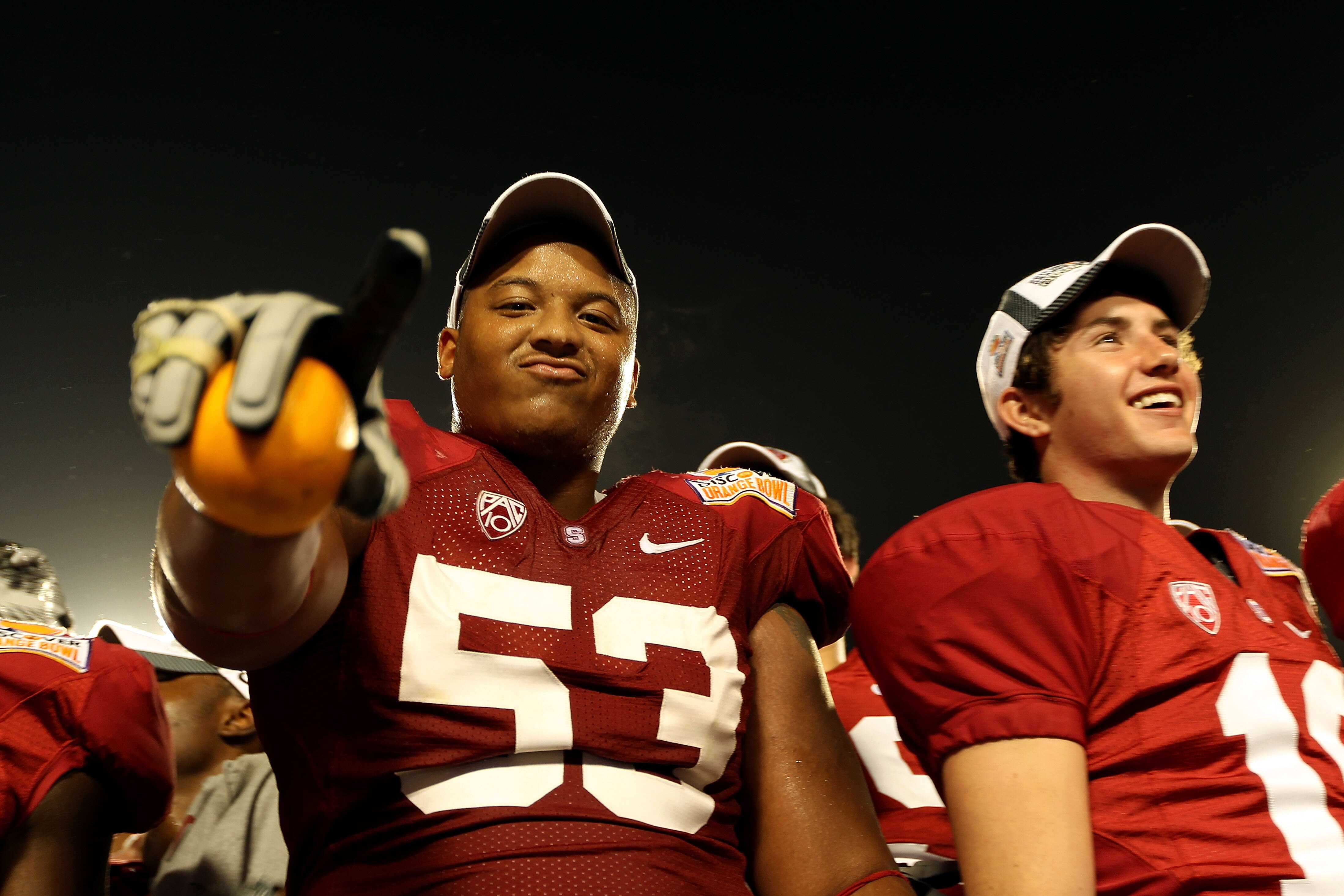 MIAMI, FL - JANUARY 03:  Derek Hall #53 of the Stanford Cardinal celebrates after Stanford won 40-12 against the Virginia Tech Hokies during the 2011 Discover Orange Bowl at Sun Life Stadium on January 3, 2011 in Miami, Florida.  (Photo by Mike Ehrmann/Ge