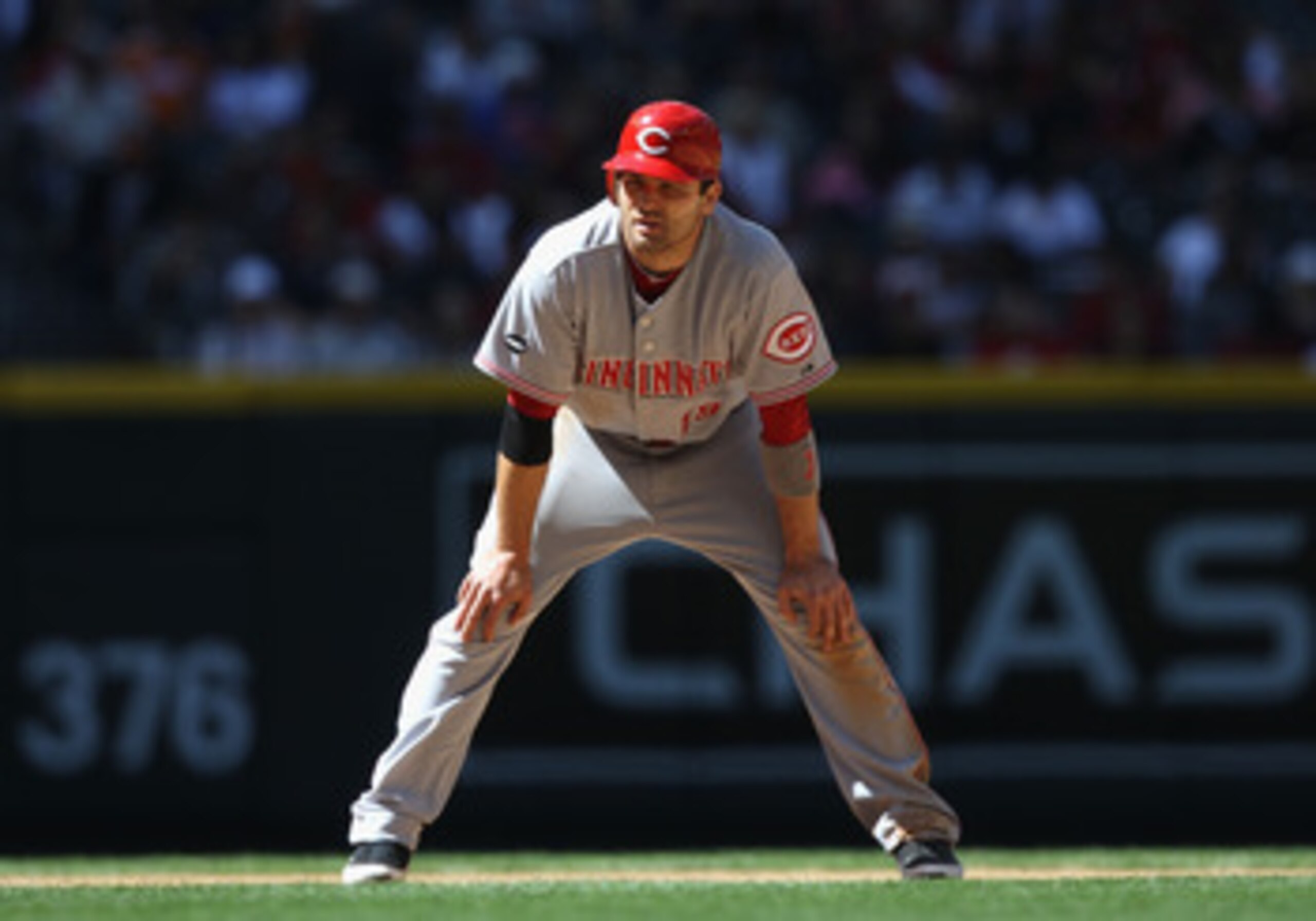 PHOENIX, AZ - APRIL 10:  Joey Votto #19 of the Cincinnati Reds leads off first base during the Major League Baseball game against the Arizona Diamondbacks at Chase Field on April 10, 2011 in Phoenix, Arizona.   The Diamondbacks defeated the Reds 10-8.  (P