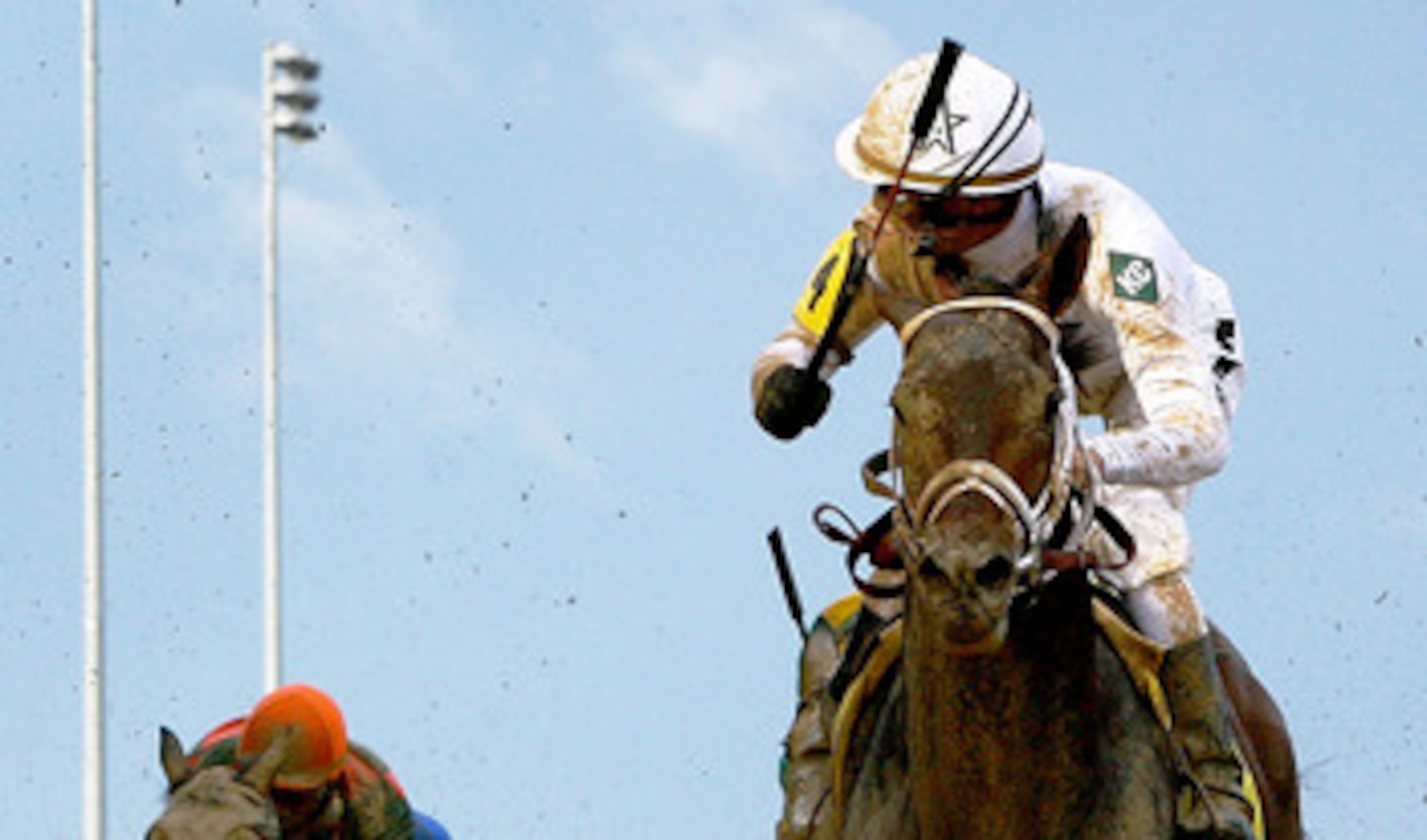 LOUISVILLE, KY - MAY 01:  Calvin Borel atop Super Saver crosses the finish line to win the 136th running of the Kentucky Derby on May 1, 2010 in Louisville, Kentucky.  (Photo by Jamie Squire/Getty Images)