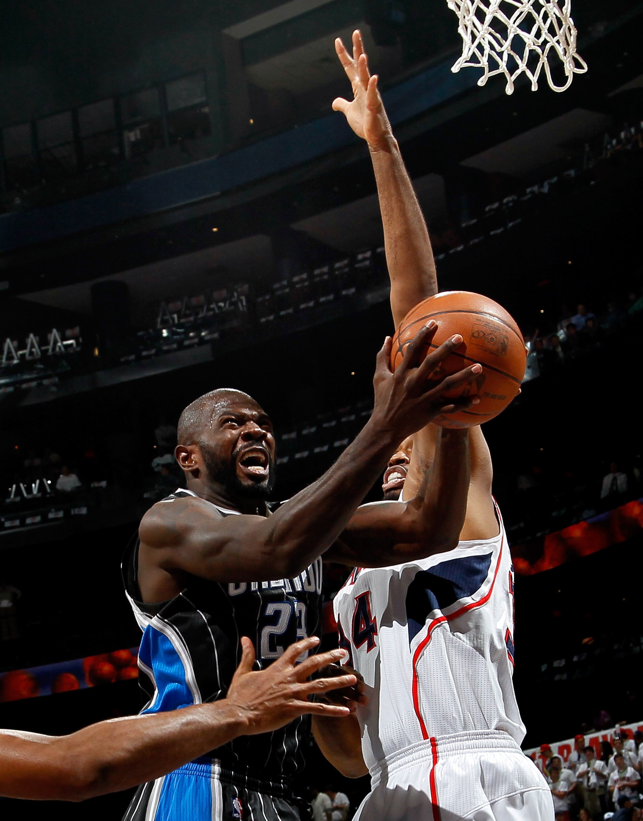 ATLANTA, GA - APRIL 28: Jason Richardson #23 of the Orlando Magic drives against Jason Collins #34 of the Atlanta Hawks during Game Six of the Eastern Conference Quarterfinals in the 2011 NBA Playoffs at Philips Arena on April 28, 2011 in Atlanta, Georgi ATLANTA, GA - APRIL 28: Jason Richardson #23 of the Orlando Magic drives against Jason Collins #34 of the Atlanta Hawks during Game Six of the Eastern Conference Quarterfinals in the 2011 NBA Playoffs at Philips Arena on April 28, 2011 in Atlanta, Georgi