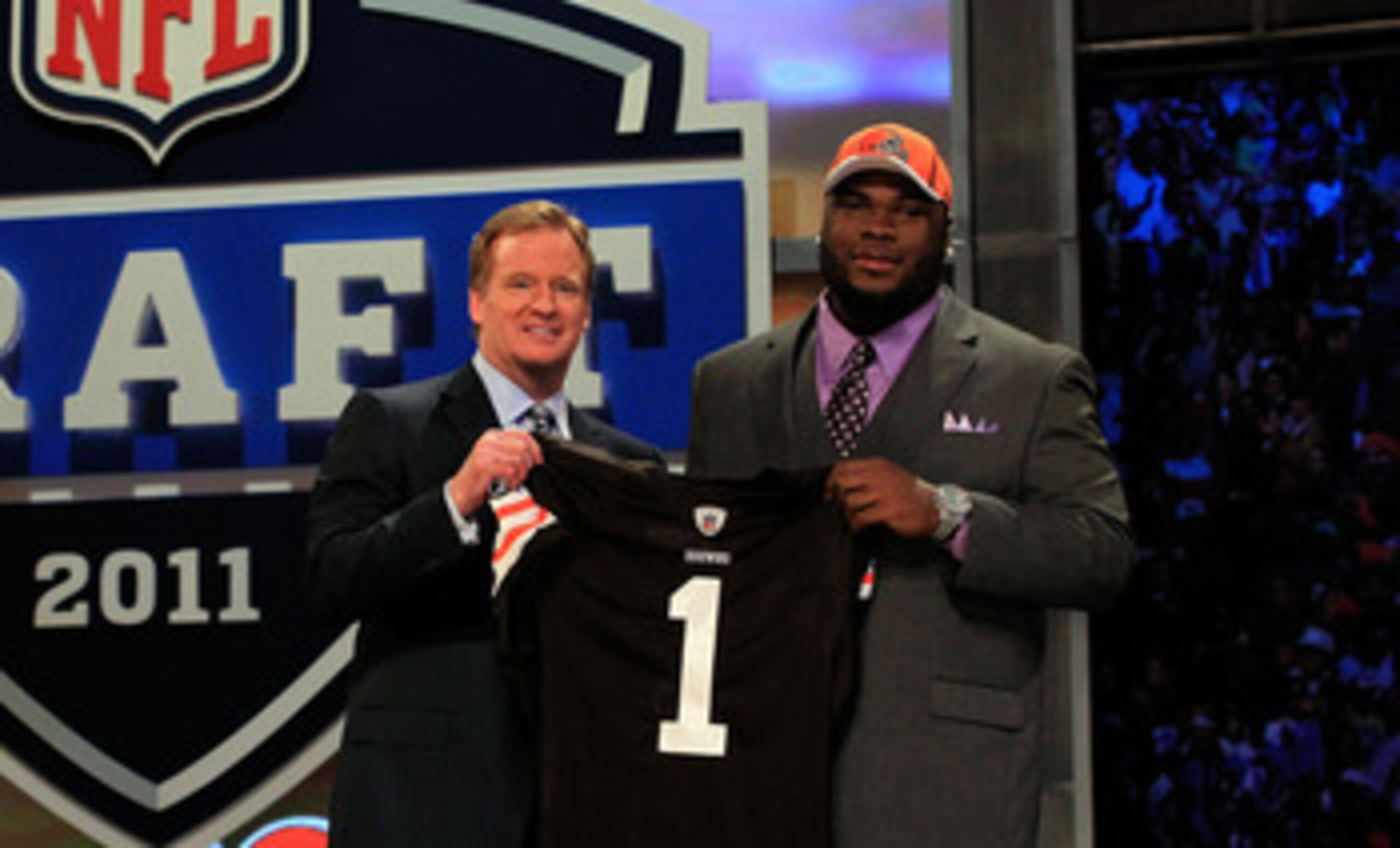 NEW YORK, NY - APRIL 28:  NFL Commissioner ROger Goodell (L) poses for a photo with Phil Taylor, #21 overall pick by the Cleveland Browns, on stage during the 2011 NFL Draft at Radio City Music Hall on April 28, 2011 in New York City.  (Photo by Chris Tro