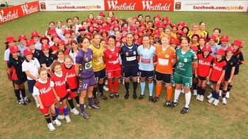 SYDNEY, AUSTRALIA - NOVEMBER 01:  Kathryn Gill, Thea Slatyer, Victoria Balomenos, Melissa Barbieri, Kyah Simon, Clare Polkinghorne and Sally Shipard pose with school children during the W-League Season Launch at the University of NSW Campus on November 1,
