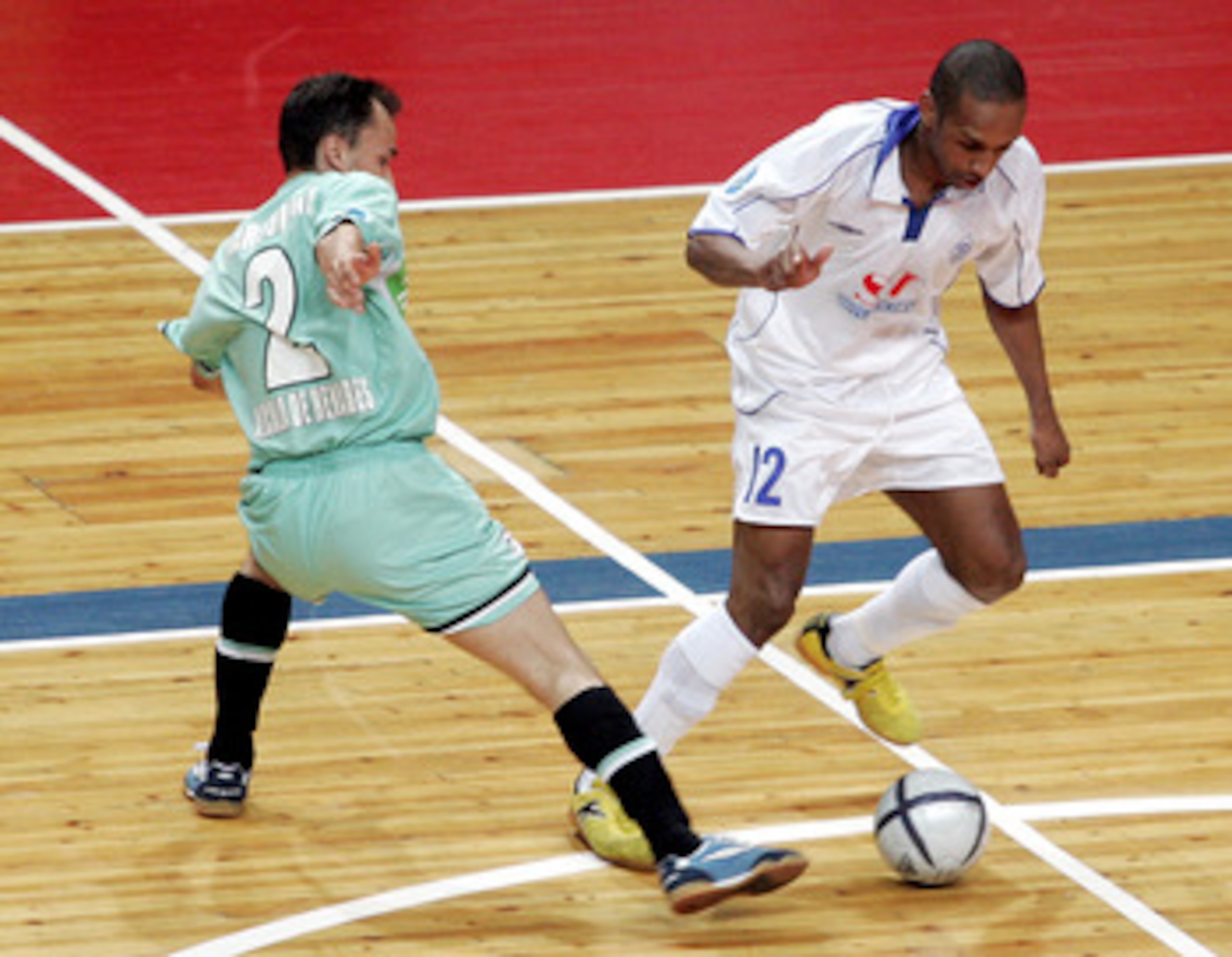 MOSCOW - MAY 7: Pele (R) of Dinamo Moscow competes against Markinio of Boomerang Interviu FS during UEFA Futsal Cup final on May 7, 2006 in Moscow, Russia. (Photo by Dmitry Korotaev/Pressphotos/Getty Images) MOSCOW - MAY 7: Pele (R) of Dinamo Moscow competes against Markinio of Boomerang Interviu FS during UEFA Futsal Cup final on May 7, 2006 in Moscow, Russia. (Photo by Dmitry Korotaev/Pressphotos/Getty Images)