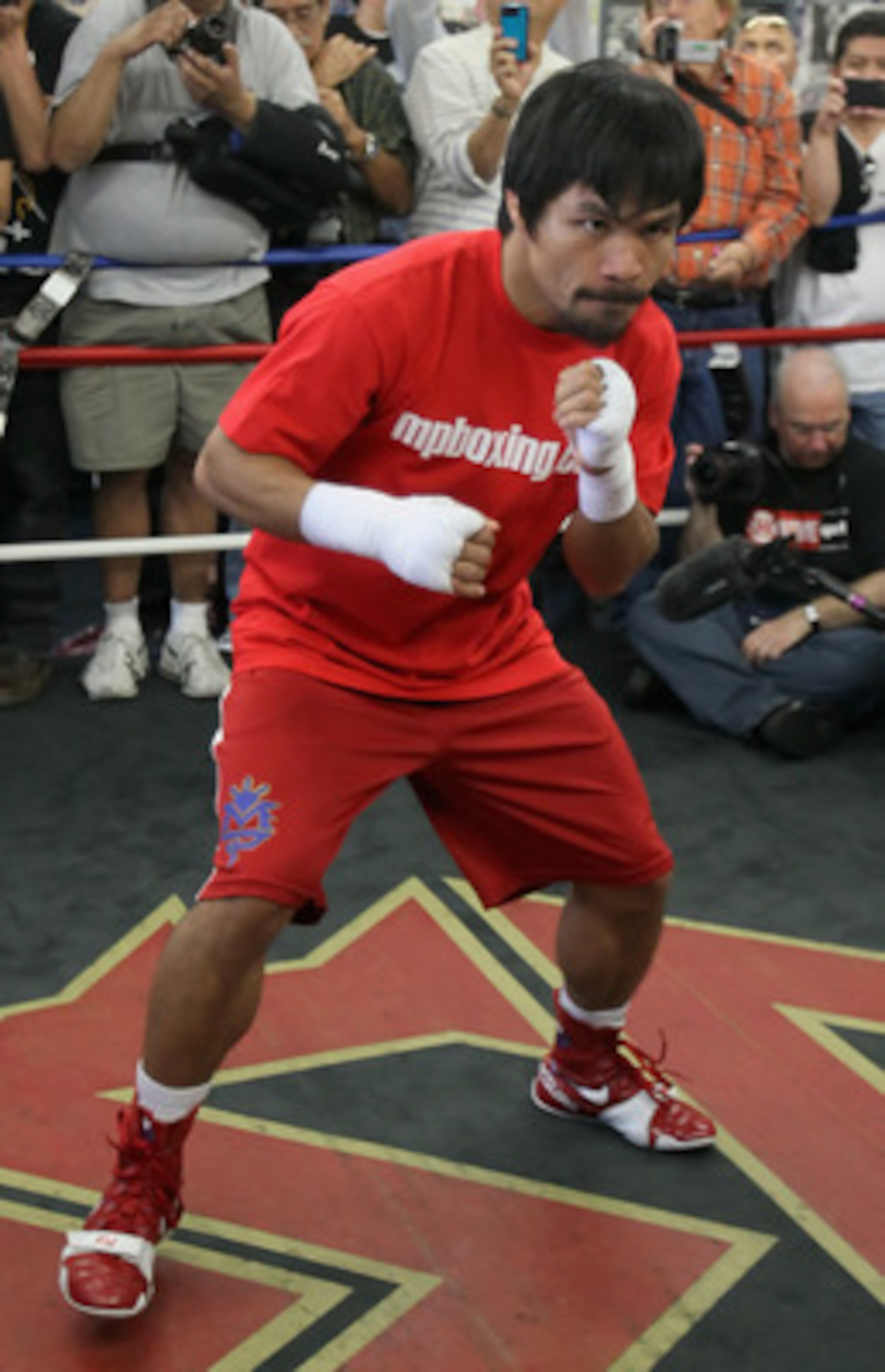 HOLLYWOOD, CA - APRIL 20: Manny Pacquiao of the Philippines trains inside the ring during a media workout at the Wild Card Boxing Club on April 20, 2011 in Hollywood, California. (Photo by Jeff Gross/Getty Images) HOLLYWOOD, CA - APRIL 20: Manny Pacquiao of the Philippines trains inside the ring during a media workout at the Wild Card Boxing Club on April 20, 2011 in Hollywood, California. (Photo by Jeff Gross/Getty Images)