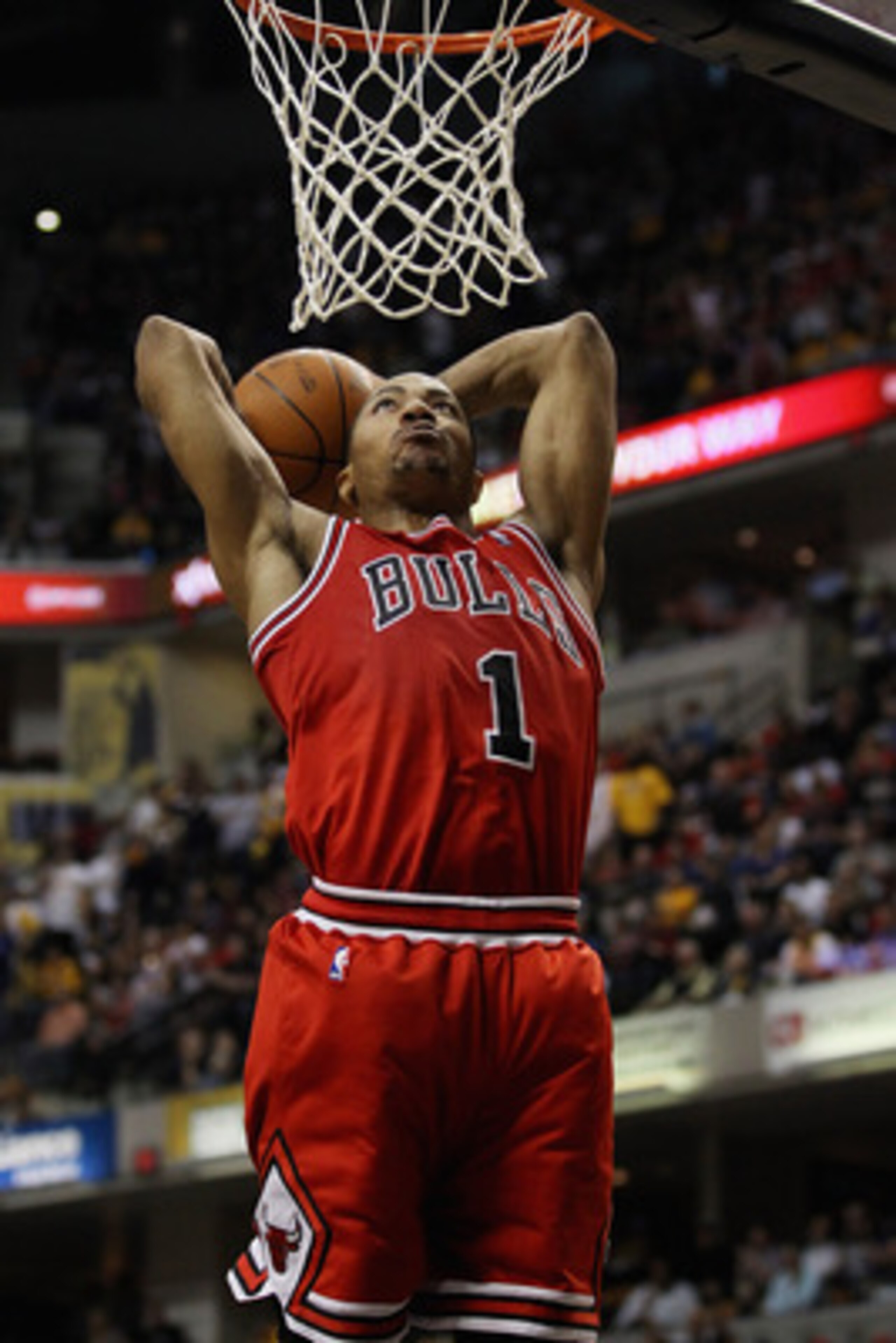 INDIANAPOLIS, IN - APRIL 23: Derrick Rose #1 of the Chicago Bulls goes uo for a dunk against the Indiana Pacers in Game Four of the Eastern Conference Quarterfinals in the 2011 NBA Playoffs at Conseco Fieldhouse on April 23, 2011 in Indianapolis, Indiana.