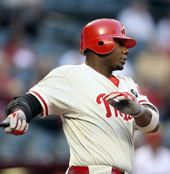 PHOENIX, AZ - APRIL 26:  Ryan Howard #6 of the Philadelphia Phillies hits a double against the Arizona Diamondbacks during the first inning of the Major League Baseball game at Chase Field on April 26, 2011 in Phoenix, Arizona.  (Photo by Christian Peters