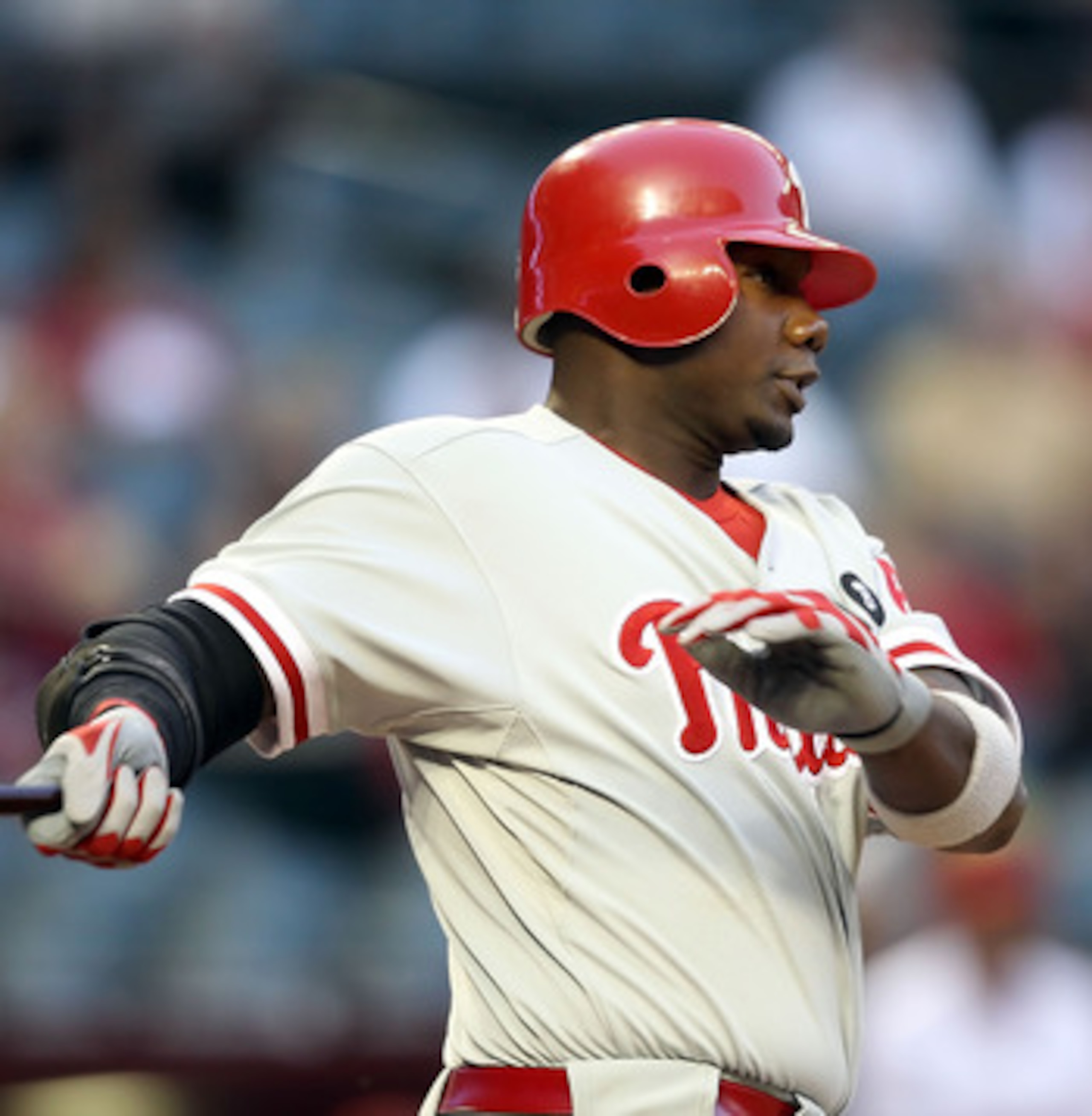 PHOENIX, AZ - APRIL 26:  Ryan Howard #6 of the Philadelphia Phillies hits a double against the Arizona Diamondbacks during the first inning of the Major League Baseball game at Chase Field on April 26, 2011 in Phoenix, Arizona.  (Photo by Christian Peters