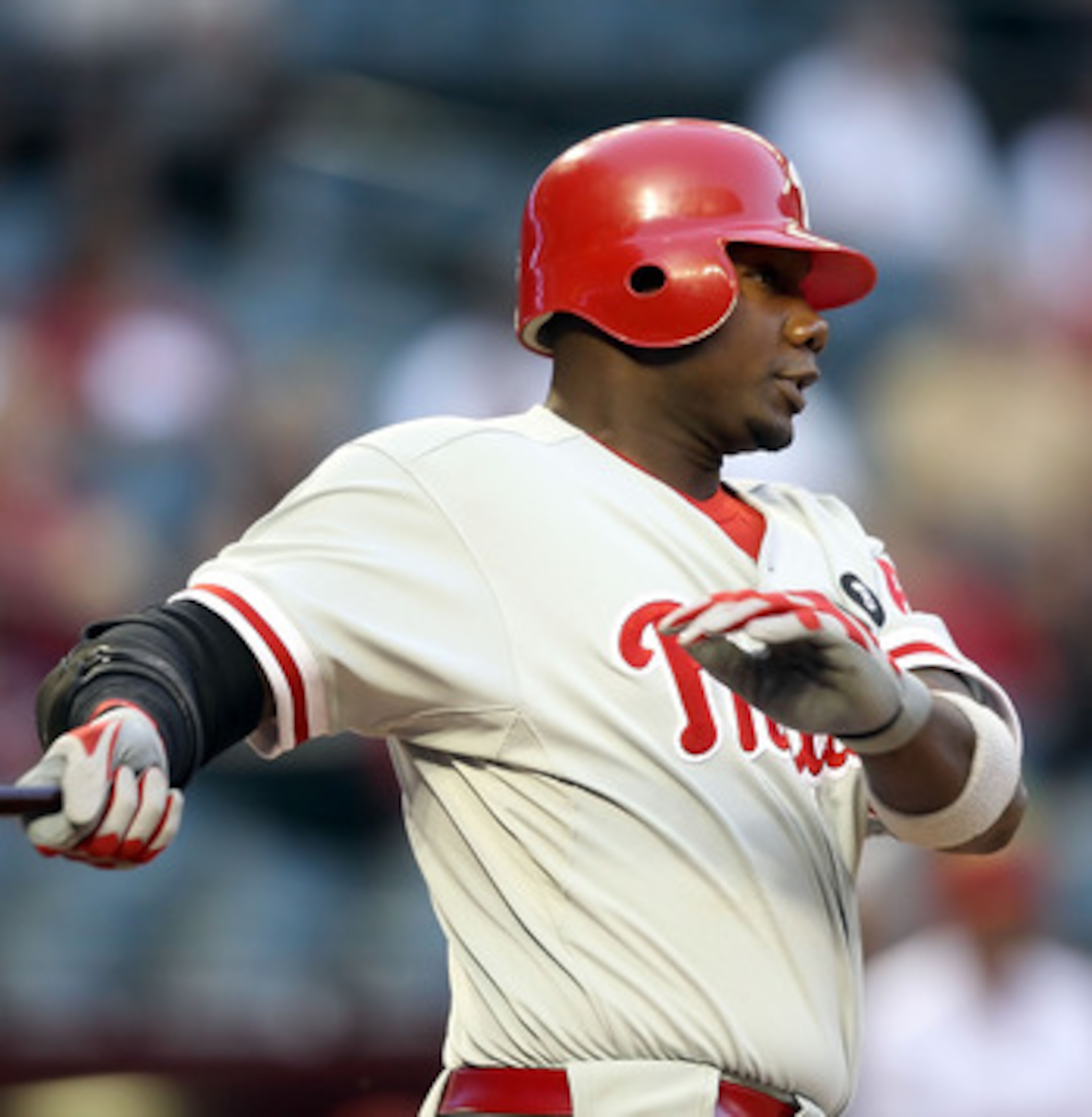 PHOENIX, AZ - APRIL 26:  Ryan Howard #6 of the Philadelphia Phillies hits a double against the Arizona Diamondbacks during the first inning of the Major League Baseball game at Chase Field on April 26, 2011 in Phoenix, Arizona.  (Photo by Christian Peters