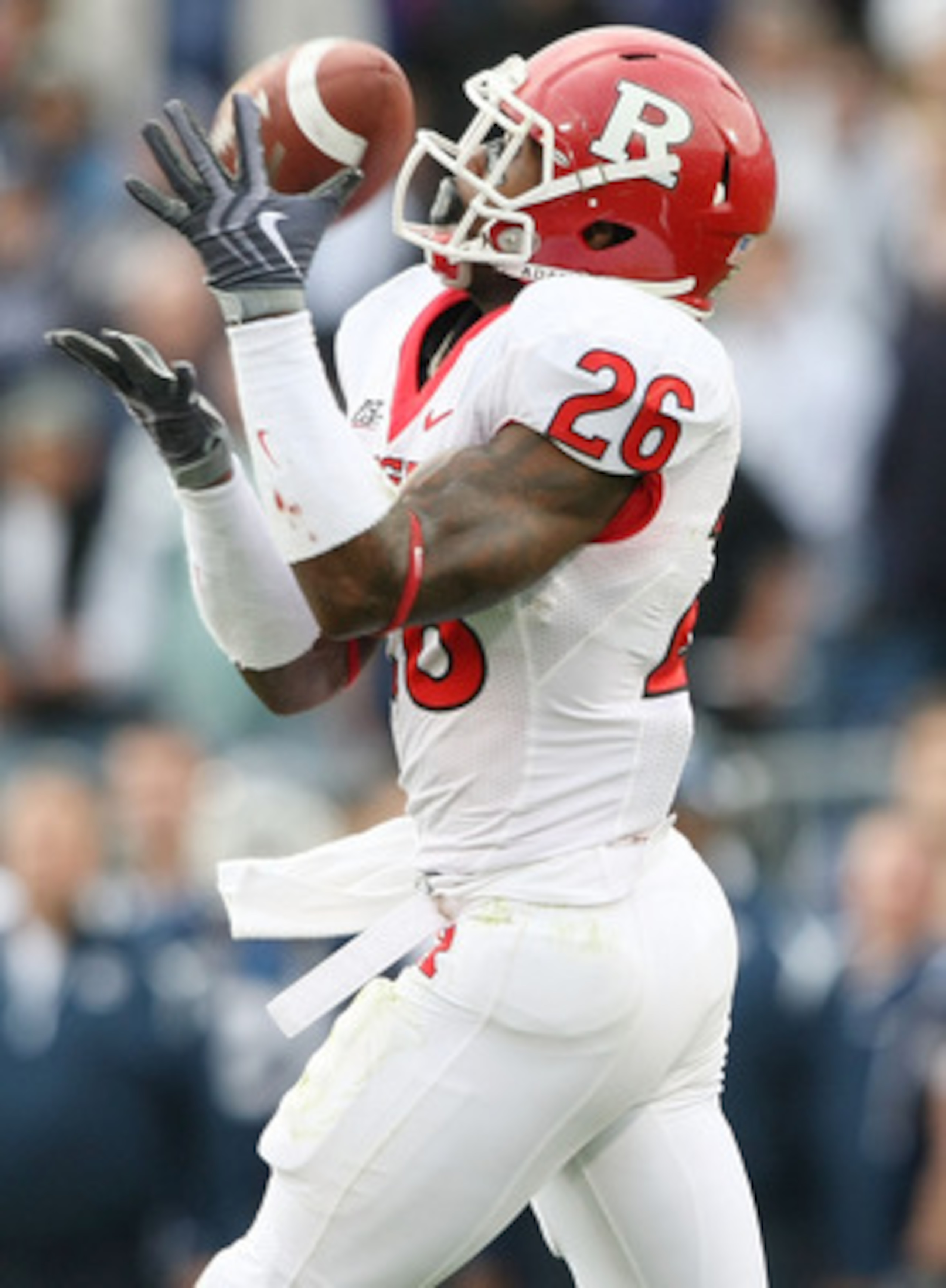 EAST HARTFORD, CT - OCTOBER 31:  Joe Lefeged #26 of the Rutgers Scarlet Knights returns a punt in the second half against the Connecticut Huskies on October 31, 2009 at Rentschler Field in East Hartford, Connecticut. Rutgers defeated Connecticut 28-24.  (