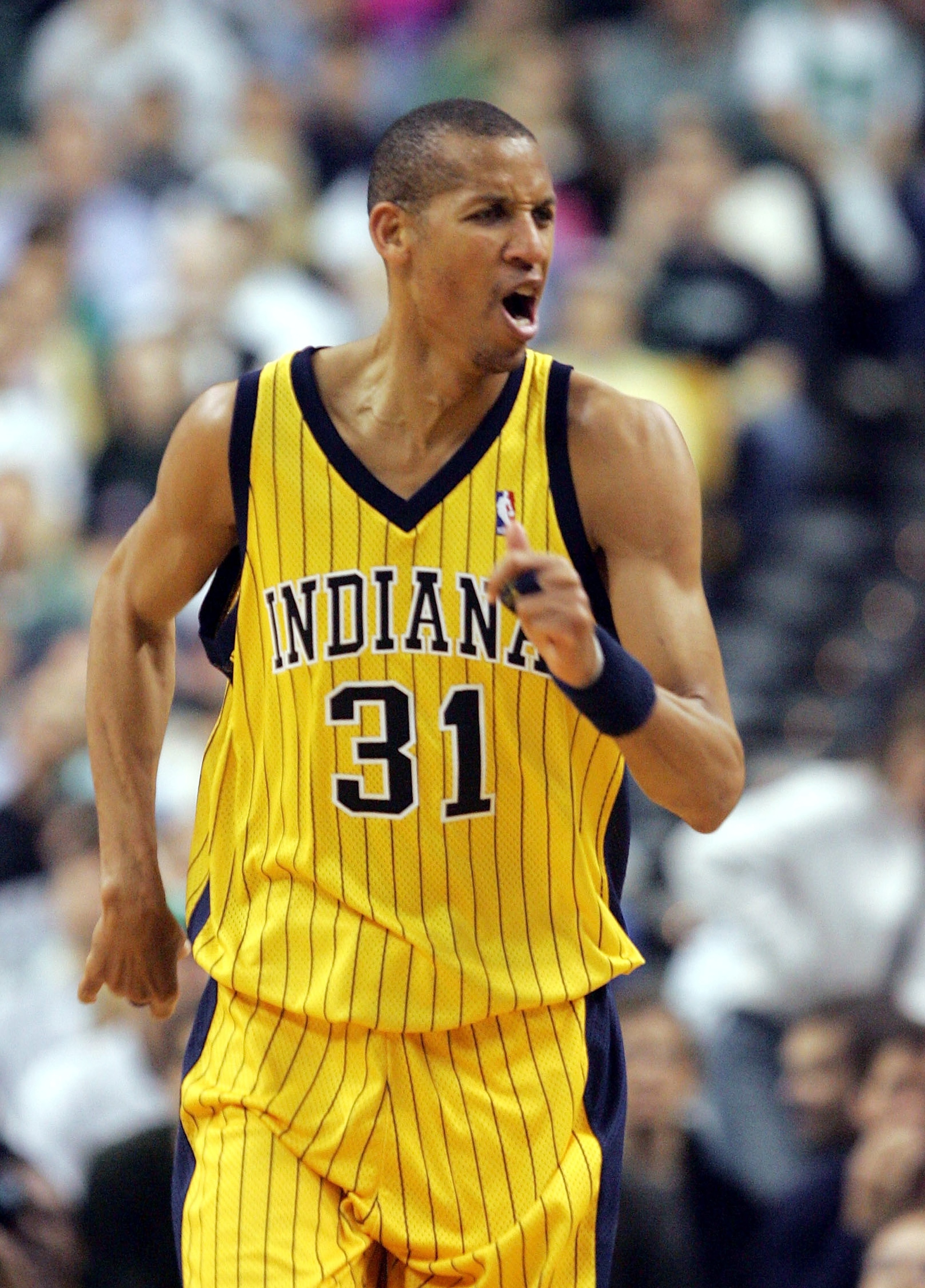 BOSTON - MAY 7: Reggie Miller #31 of the Indiana Pacers reacts after scoring a three ponit goal against the Boston Celtics in Game seven of the Eastern Conference Quarterfinals during the 2005 NBA Playoffs on May 7, 2005 at Fleet Center in Boston, Massach