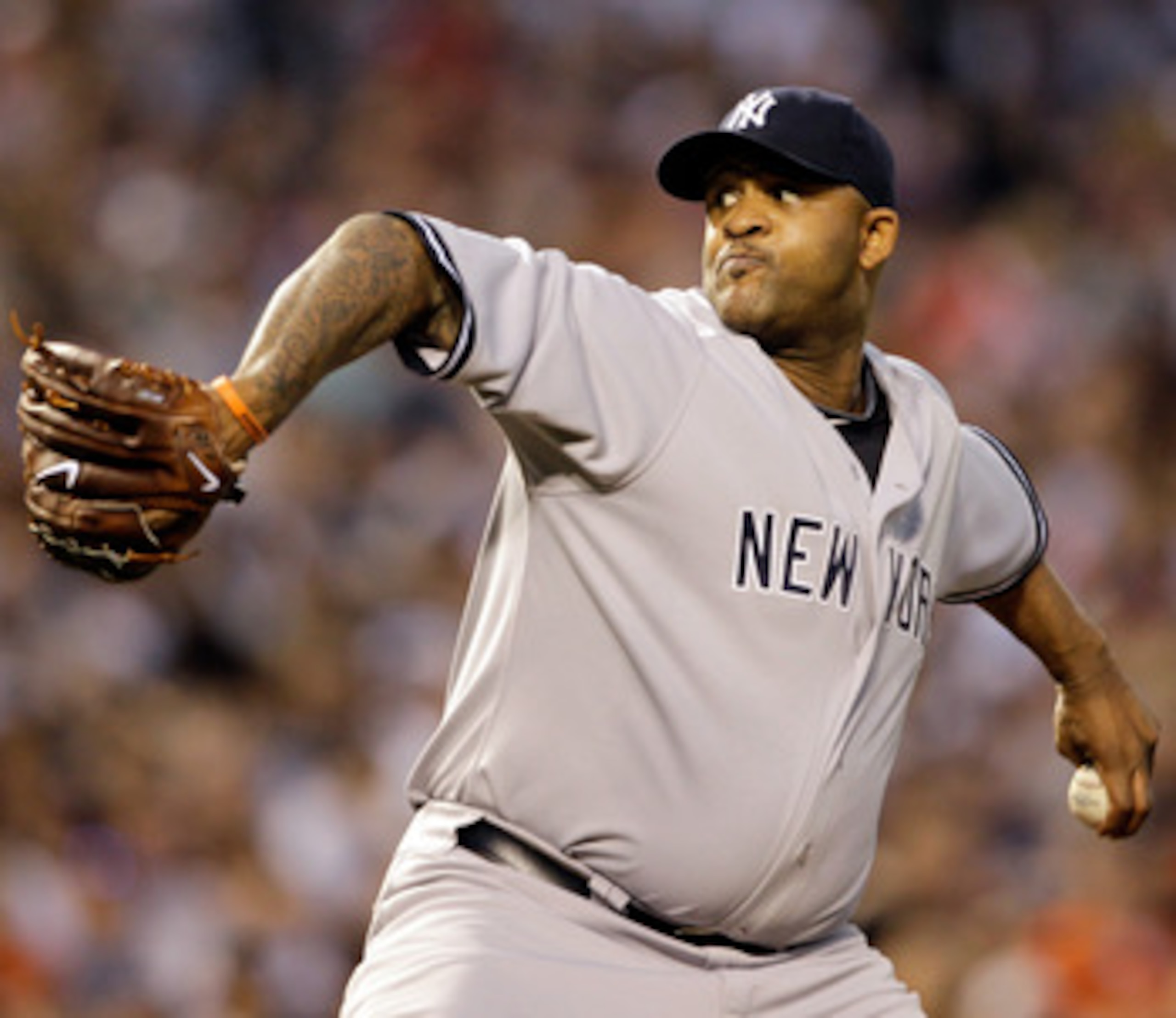 BALTIMORE, MD - APRIL 23:  Pitcher CC Sabathia #52 of the New York Yankees delivers to a Baltimore Orioles batter at Oriole Park at Camden Yards on April 23, 2011 in Baltimore, Maryland.  (Photo by Rob Carr/Getty Images)