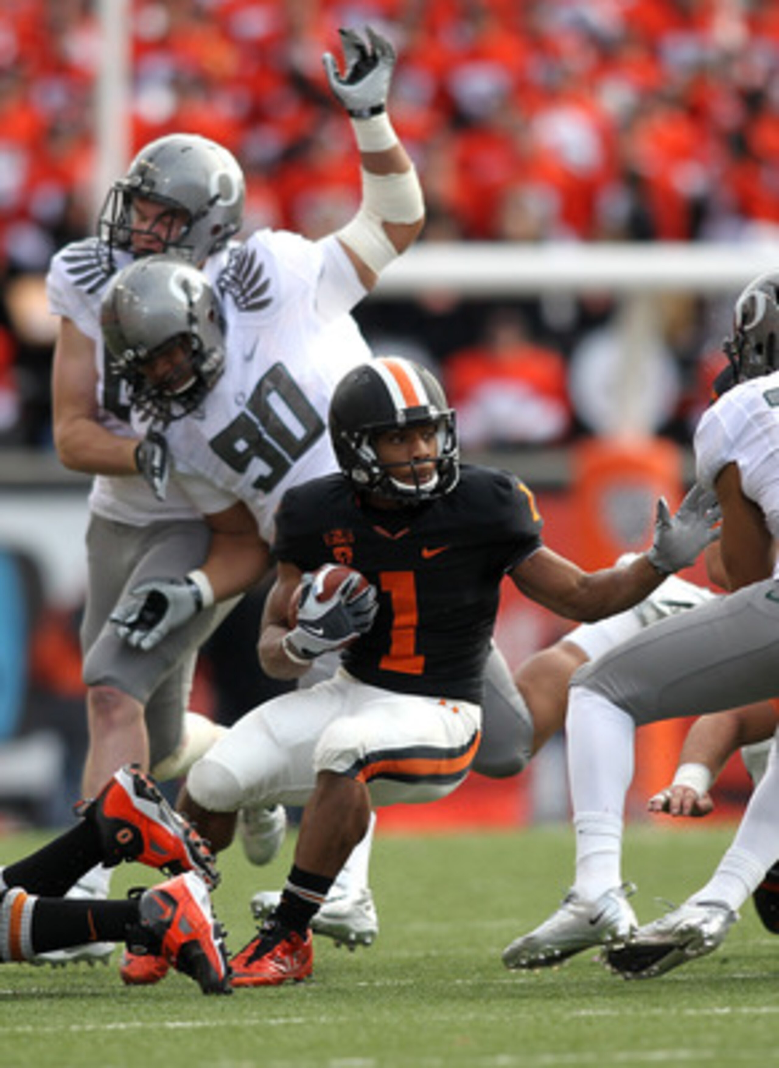 CORVALLIS, OR - DECEMBER 04: Jacquizz Rodgers #1 of the Oregon State Beavers runs the ball against the Oregon Ducks during the 114th Civil War on December 4, 2010 at the Reser Stadium in Corvallis, Oregon. (Photo by Jonathan Ferrey/Getty Images) CORVALLIS, OR - DECEMBER 04: Jacquizz Rodgers #1 of the Oregon State Beavers runs the ball against the Oregon Ducks during the 114th Civil War on December 4, 2010 at the Reser Stadium in Corvallis, Oregon. (Photo by Jonathan Ferrey/Getty Images)