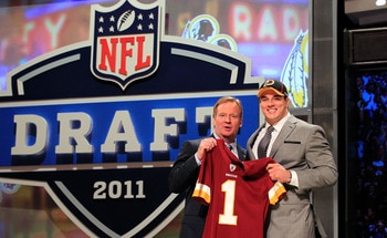 NEW YORK, NY - APRIL 28:  NFL Commissioner Roger Goodell (L) poses for a photo with Ryan Kerrigan, #16 overall pick by the Washington Redskins, on stage during the 2011 NFL Draft at Radio City Music Hall on April 28, 2011 in New York City.  (Photo by Chri