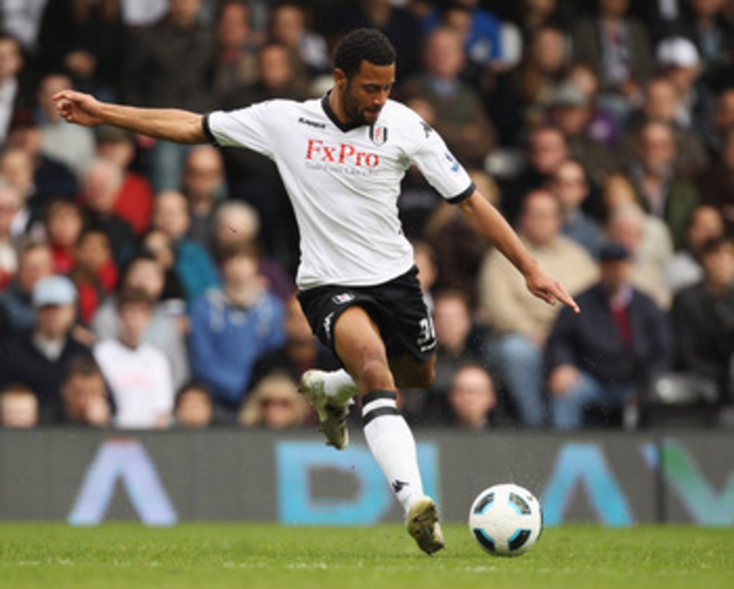 LONDON, ENGLAND - APRIL 03:  Moussa Dembele of Fulham in action during the Barclays Premier League match between Fulham and Blackpool at Craven Cottage on April 3, 2011 in London, England.  (Photo by Ian Walton/Getty Images)