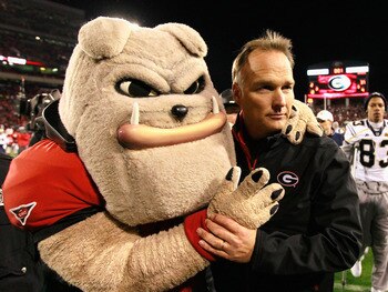 ATHENS, GA - NOVEMBER 27: Head coach Mark Richt and Hairy, mascot of the Georgia Bulldogs, celebrate their 42-34 win over the Georgia Tech Yellow Jackets at Sanford Stadium on November 27, 2010 in Athens, Georgia. (Photo by Kevin C. Cox/Getty Images) ATHENS, GA - NOVEMBER 27: Head coach Mark Richt and Hairy, mascot of the Georgia Bulldogs, celebrate their 42-34 win over the Georgia Tech Yellow Jackets at Sanford Stadium on November 27, 2010 in Athens, Georgia. (Photo by Kevin C. Cox/Getty Images)