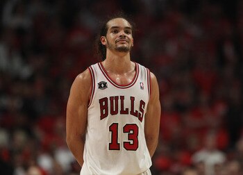 CHICAGO, IL - APRIL 26: Joakim Noah #13 of the Chicago Bulls smiles at family in the stands near the end of a win over the Indiana Pacers in Game Five of the Eastern Conference Quarterfinals in the 2011 NBA Playoffs at the United Center on April 26, 2011