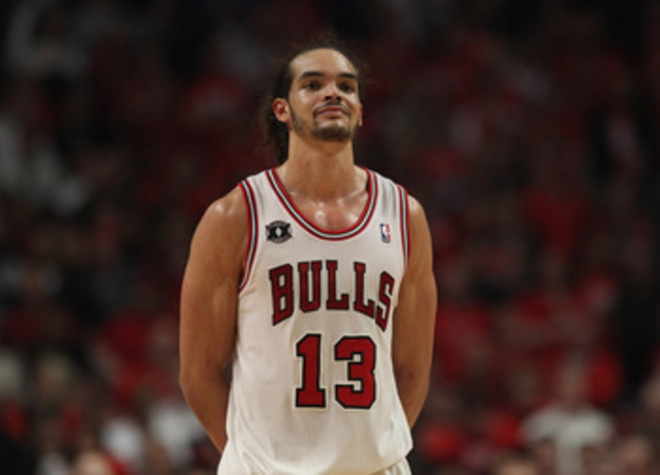 CHICAGO, IL - APRIL 26: Joakim Noah #13 of the Chicago Bulls smiles at family in the stands near the end of a win over the Indiana Pacers in Game Five of the Eastern Conference Quarterfinals in the 2011 NBA Playoffs at the United Center on April 26, 2011