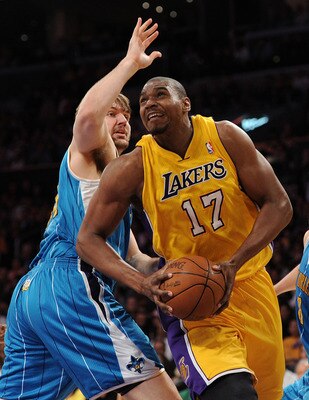LOS ANGELES, CA - APRIL 20:  Andrew Bynum #17 of the Los Angeles Lakers makes a move on Aaron Gray #34 of the New Orleans Hornets in Game Two of the Western Conference Quarterfinals in the 2011 NBA Playoffs on April 20, 2011 at Staples Center in Los Angel