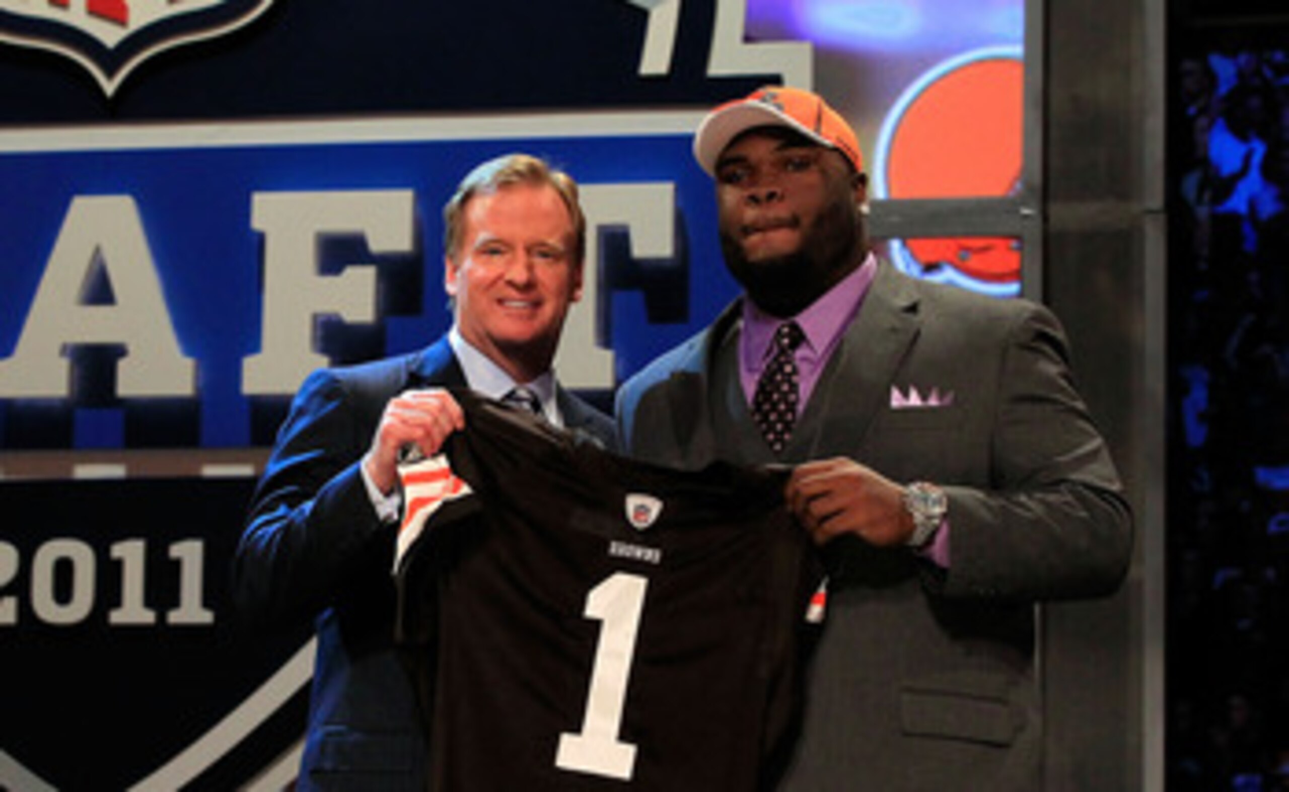 NEW YORK, NY - APRIL 28:  NFL Commissioner Roger Goodell (L) poses for a photo with Phil Taylor, #21 overall pick by the Cleveland Browns, on stage during the 2011 NFL Draft at Radio City Music Hall on April 28, 2011 in New York City.  (Photo by Chris Tro