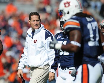 AUBURN, AL - NOVEMBER 06: Coach Gene Chizik of the Auburn Tigers watches warmups before play against the Chattanooga Mocs November 6, 2010 at Jordan-Hare Stadium in Auburn, Alabama. (Photo by Al Messerschmidt/Getty Images) AUBURN, AL - NOVEMBER 06: Coach Gene Chizik of the Auburn Tigers watches warmups before play against the Chattanooga Mocs November 6, 2010 at Jordan-Hare Stadium in Auburn, Alabama. (Photo by Al Messerschmidt/Getty Images)