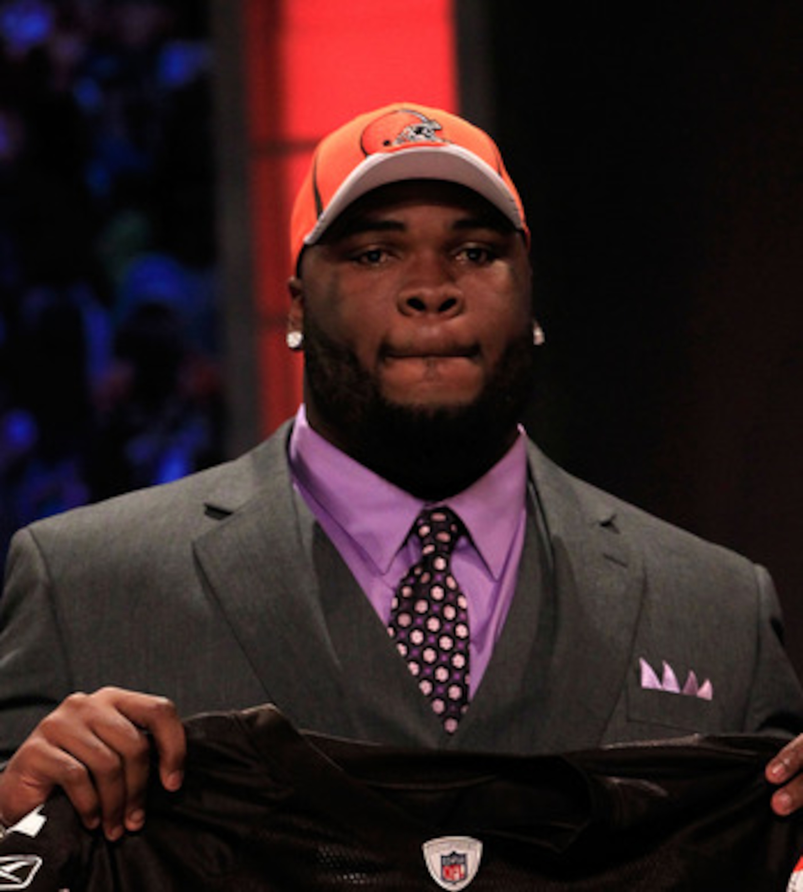 NEW YORK, NY - APRIL 28:  Phil Taylor, #21 overall pick by the Cleveland Browns, holds up a jersey on stage during the 2011 NFL Draft at Radio City Music Hall on April 28, 2011 in New York City.  (Photo by Chris Trotman/Getty Images)