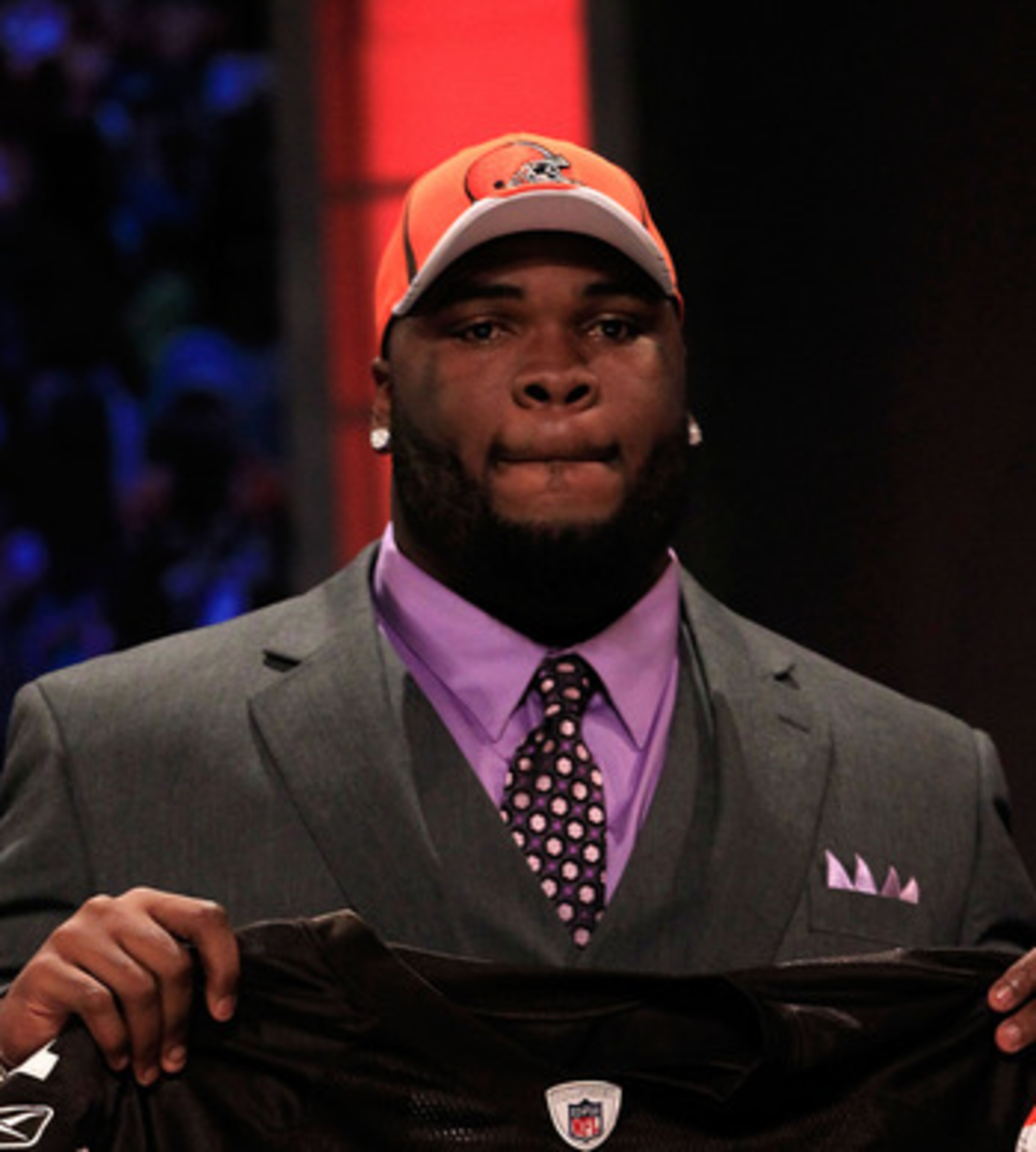 NEW YORK, NY - APRIL 28:  Phil Taylor, #21 overall pick by the Cleveland Browns, holds up a jersey on stage during the 2011 NFL Draft at Radio City Music Hall on April 28, 2011 in New York City.  (Photo by Chris Trotman/Getty Images)