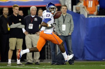 GLENDALE, AZ - JANUARY 04:  Brandyn Thompson #13 of the Boise State Broncos runs into the endzone after a 50-yard interception return for a touchdown in the first quarter against the TCU Horned Frogs during the Tostitos Fiesta Bowl at the Universtity of P