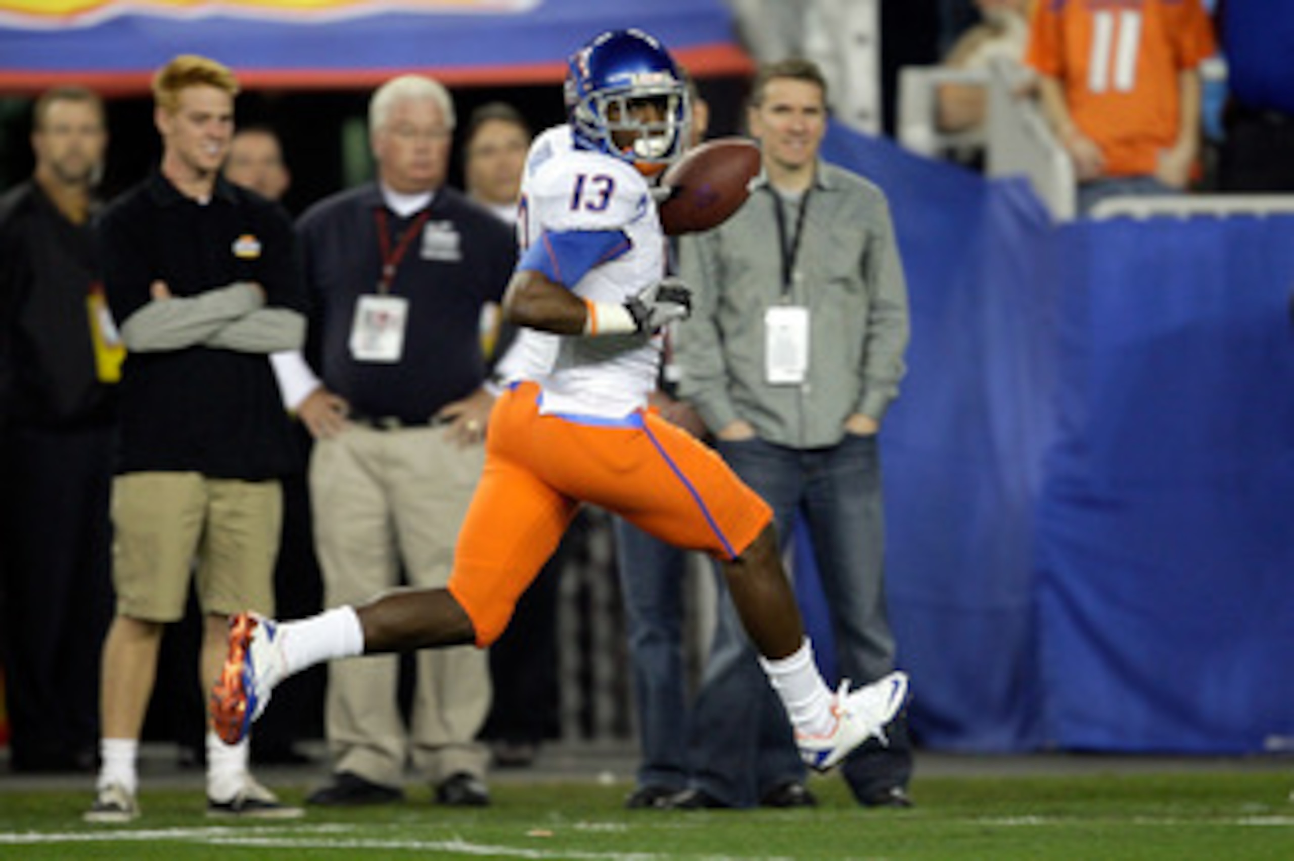 GLENDALE, AZ - JANUARY 04:  Brandyn Thompson #13 of the Boise State Broncos runs into the endzone after a 50-yard interception return for a touchdown in the first quarter against the TCU Horned Frogs during the Tostitos Fiesta Bowl at the Universtity of P