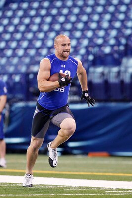 INDIANAPOLIS, IN - MARCH 1: Defensive back Tyler Sash #42 of Iowa runs with the football during the 2011 NFL Scouting Combine at Lucas Oil Stadium on February 28, 2011 in Indianapolis, Indiana. (Photo by Joe Robbins/Getty Images)