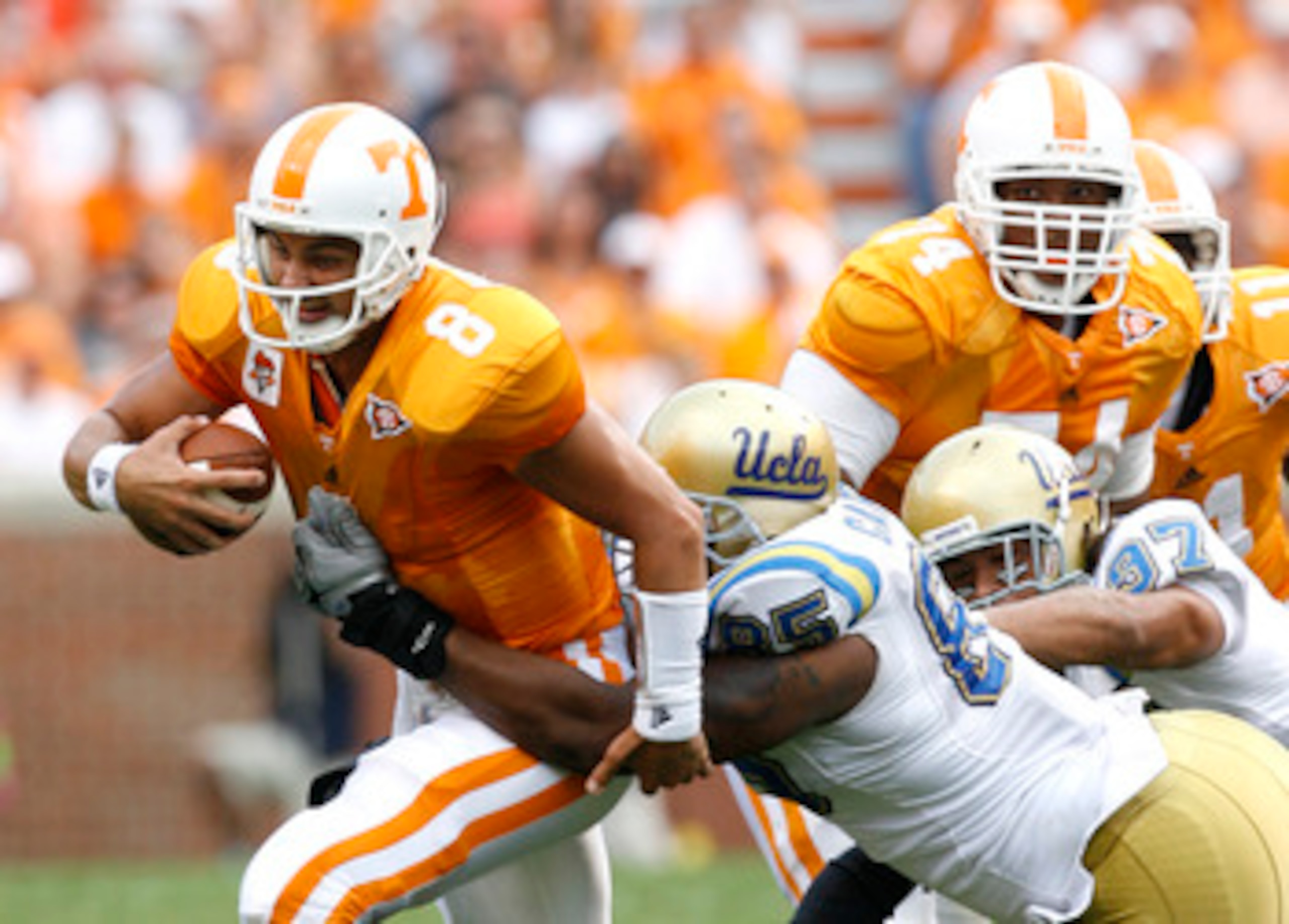KNOXVILLE, TN - SEPTEMBER 12: David Carter #85 of the UCLA Bruins sacks Jonathan Crompton #8 of the Tennessee Volunteers on September 12, 2009 at Neyland Stadium in Knoxville, Tennessee. (Photo by Joe Murphy/Getty Images)