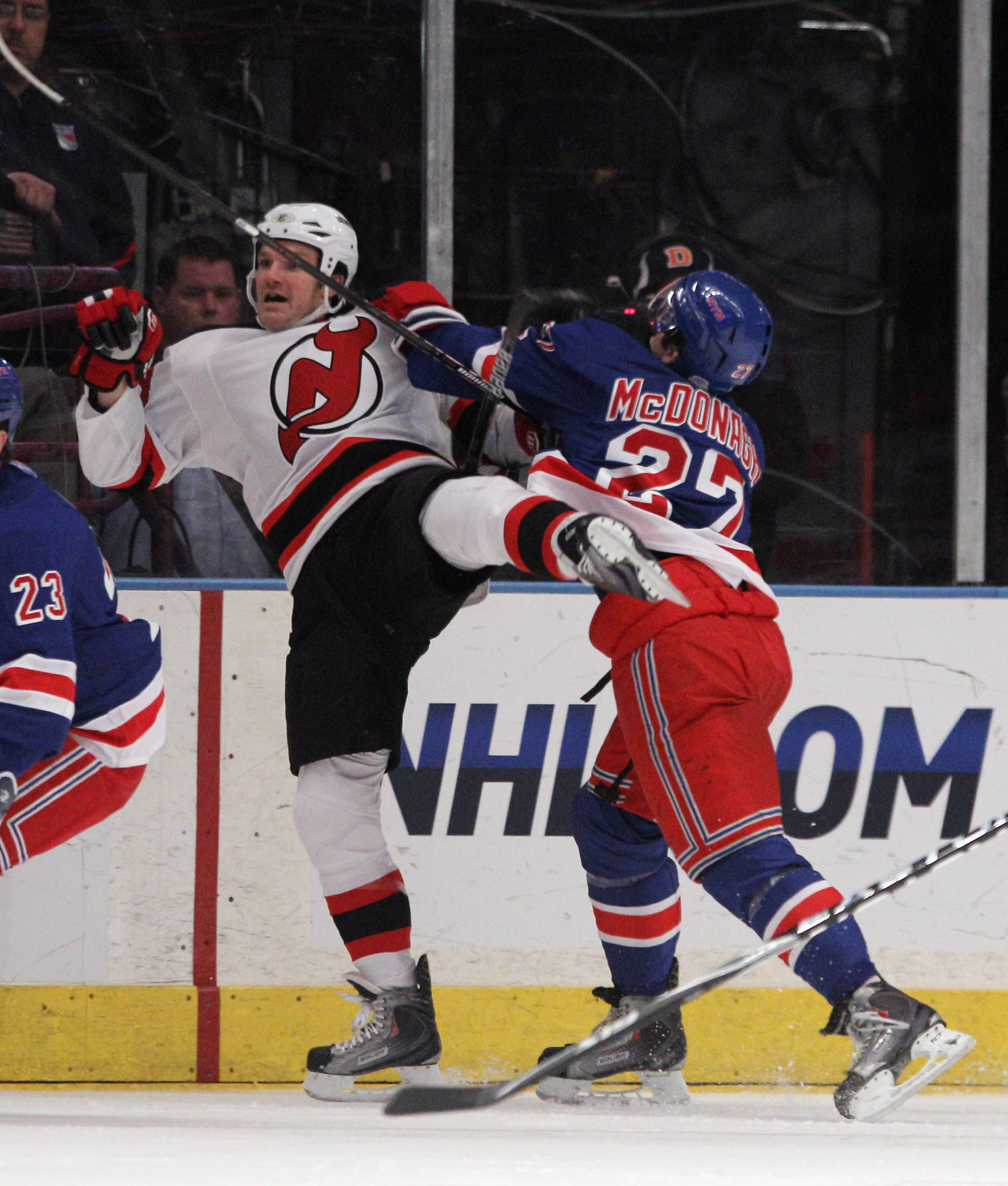 NEW YORK, NY - APRIL 09: Ryan McDonagh #27 of the New York Rangers hits David Clarkson #23 of the New Jersey Devils at Madison Square Garden on April 9, 2011 in New York City. The Rangers defeated the Devils 5-2. (Photo by Bruce Bennett/Getty Images)