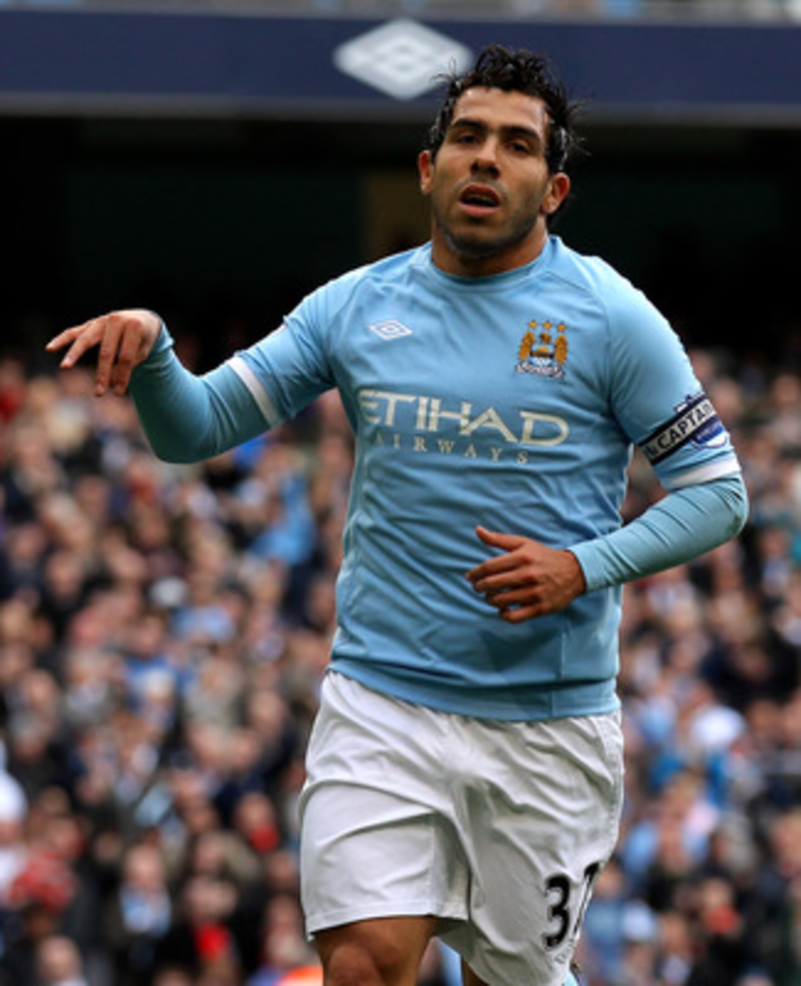 MANCHESTER, ENGLAND - APRIL 03:  Carlos Tevez of Manchester City celebrates scoring his team's second goal, from a penalty during the Barclays Premier League match between Manchester City and Sunderland at the City of Manchester Stadium on April 3, 2011 i