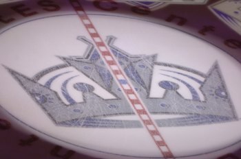 LOS ANGELES - NOVEMBER 9:  The Los Angeles Kings logo is shown on the ice before the game against the San Jose Sharks on November 9, 2006 at Staples Center in Los Angeles, California. The Sharks won 7-3. (Photo by Noah Graham/Getty Images)