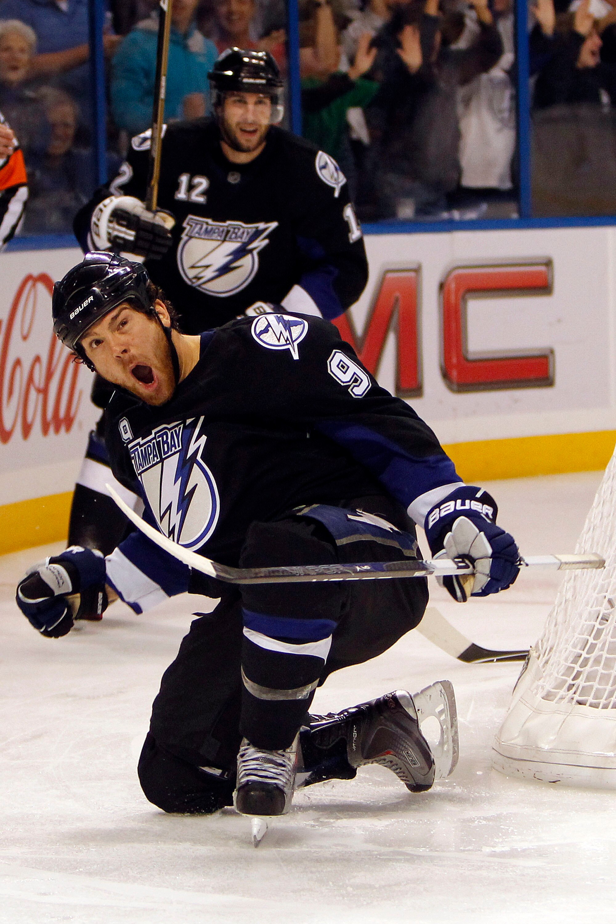 TAMPA, FL - APRIL 25: Steve Downie #9 of the Tampa Bay Lightning celebrates a goal against the Pittsburgh Penguins in Game Six of the Eastern Conference Quarterfinals during the 2011 NHL Stanley Cup Playoffs at the St. Pete Times Forum on April 25, 2011 i